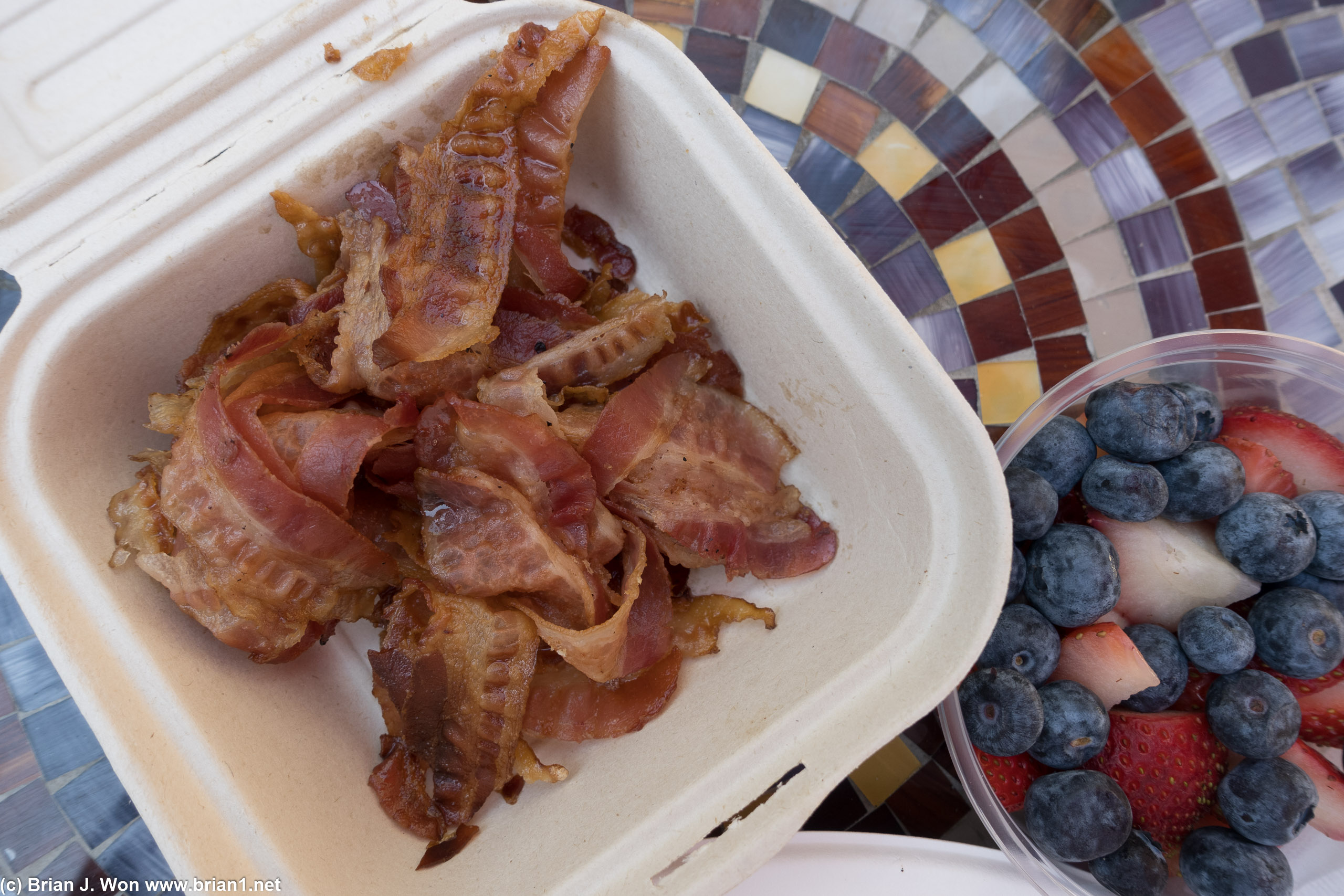A massive amount of low-medium quality bacon with a very good fruit cup.