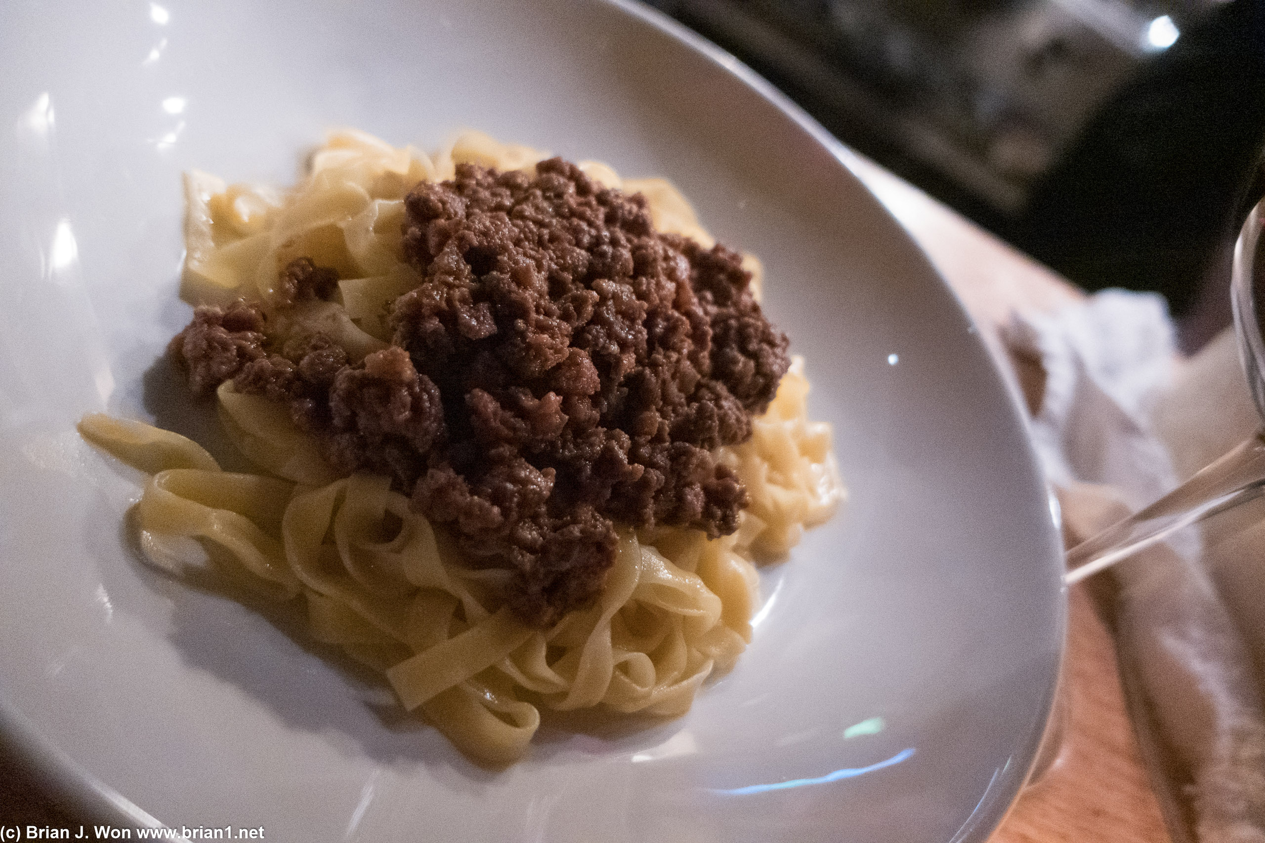 Close-up of the ragu atop the fresh pasta.