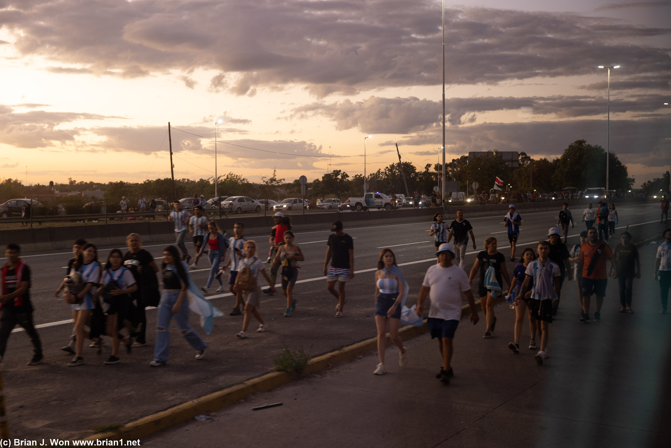 A bit deeper into sunrise, started seeing fans walking back from the airport.