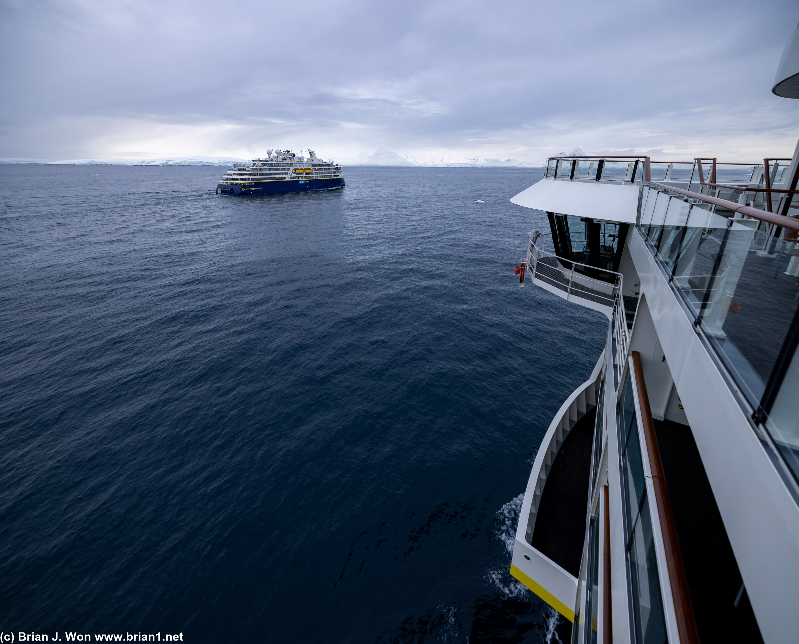 Out of the Lemaire Channel, the National Geographic Resolution prepares to turn to port and to continue their journey south.