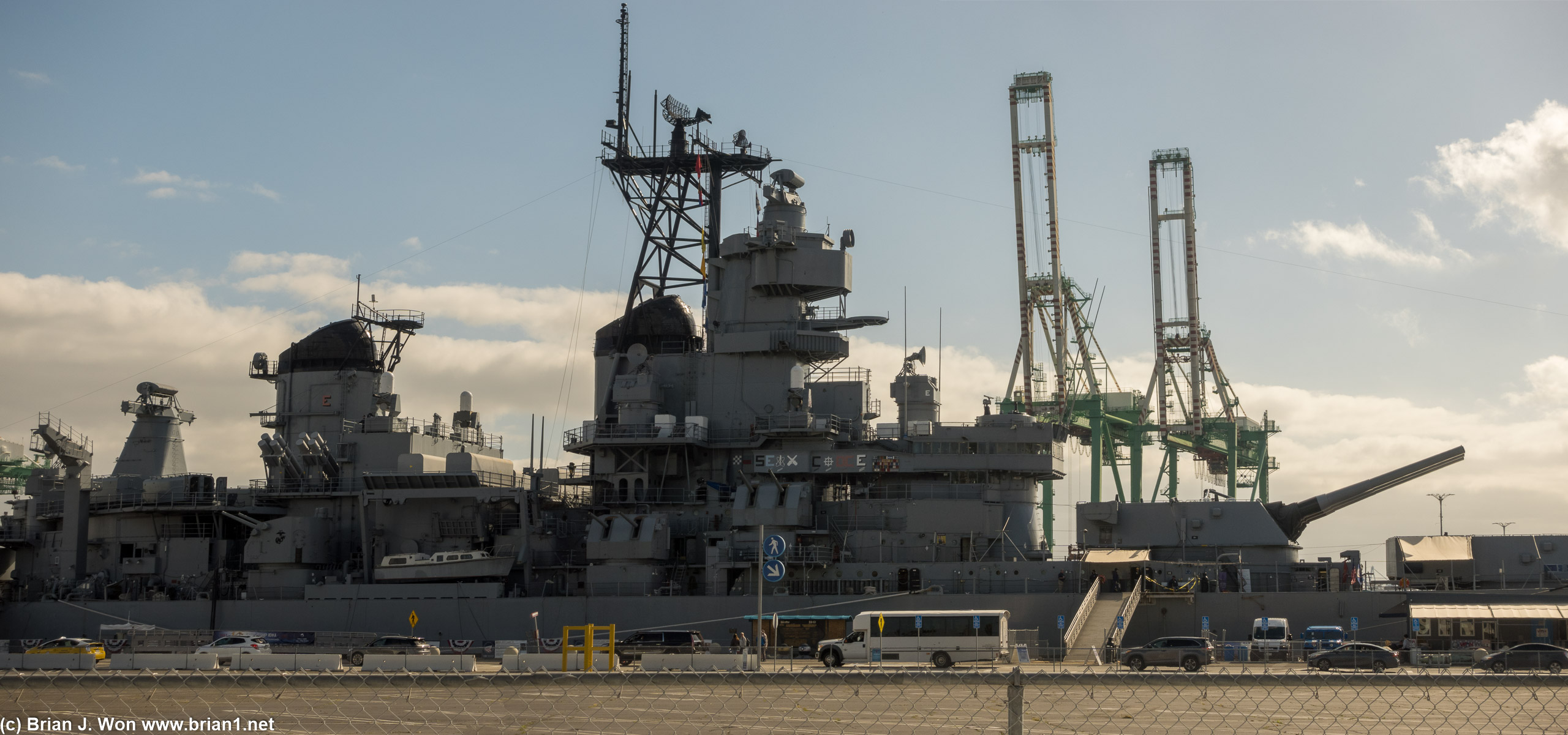 USS Iowa (BB-61) dominates the cruise ship pier.