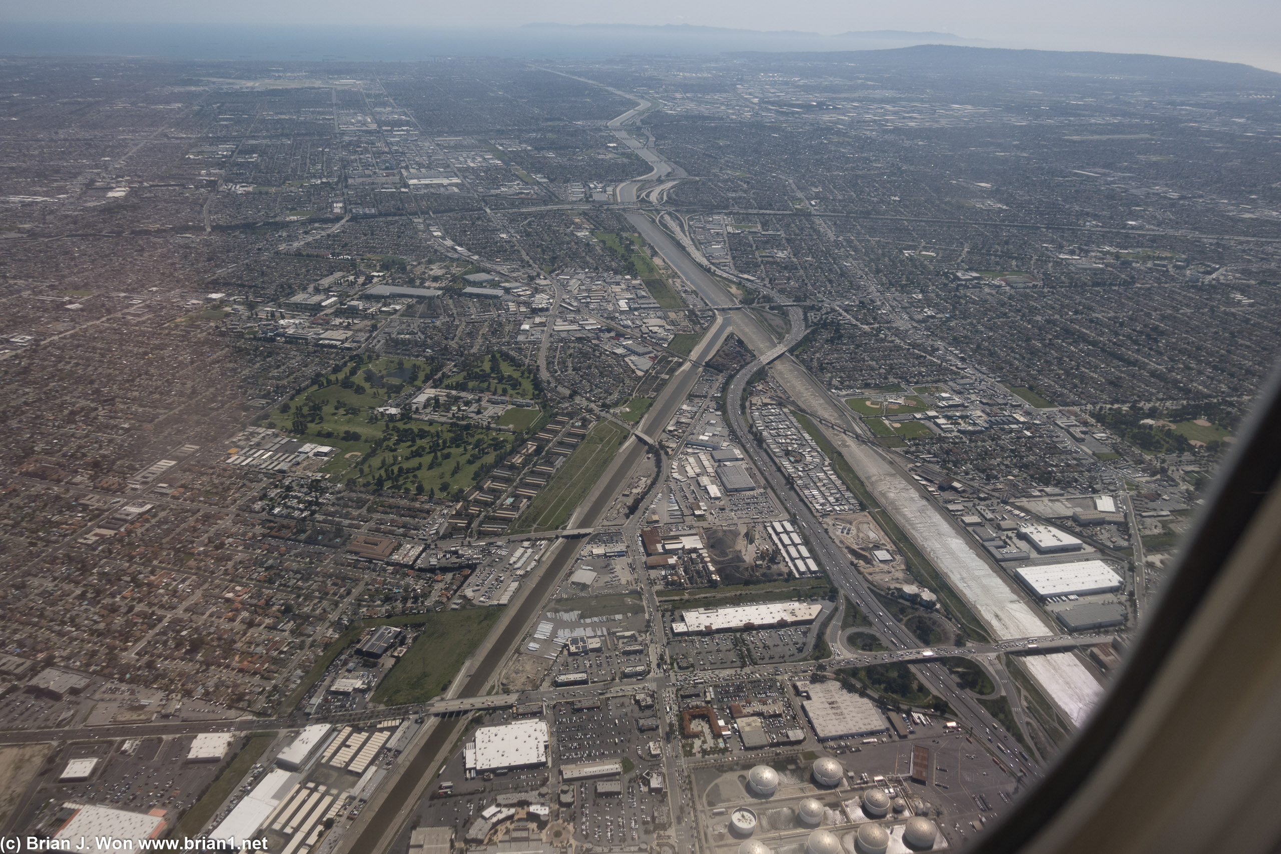 Los Angeles River tributary angles in from bottom left to the main LA RIver, as I-710 snakes over and alongside.