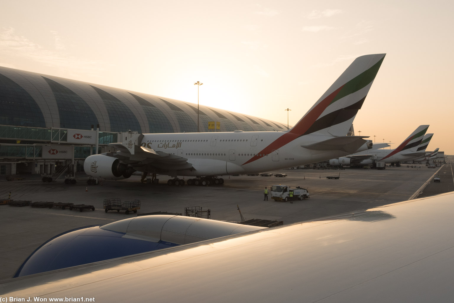 Row of Emirates Airbus A380's lined up at Terminal 3 at DXB.