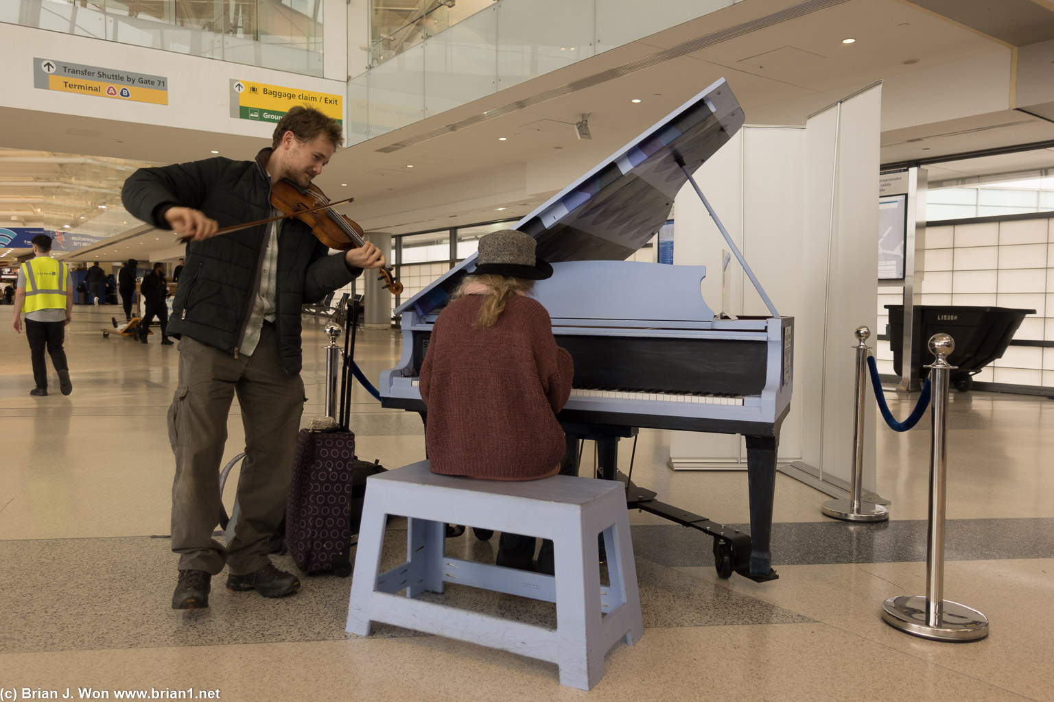 Newark Airport has a bunch of pianos, I suspect the violinist brought his own.