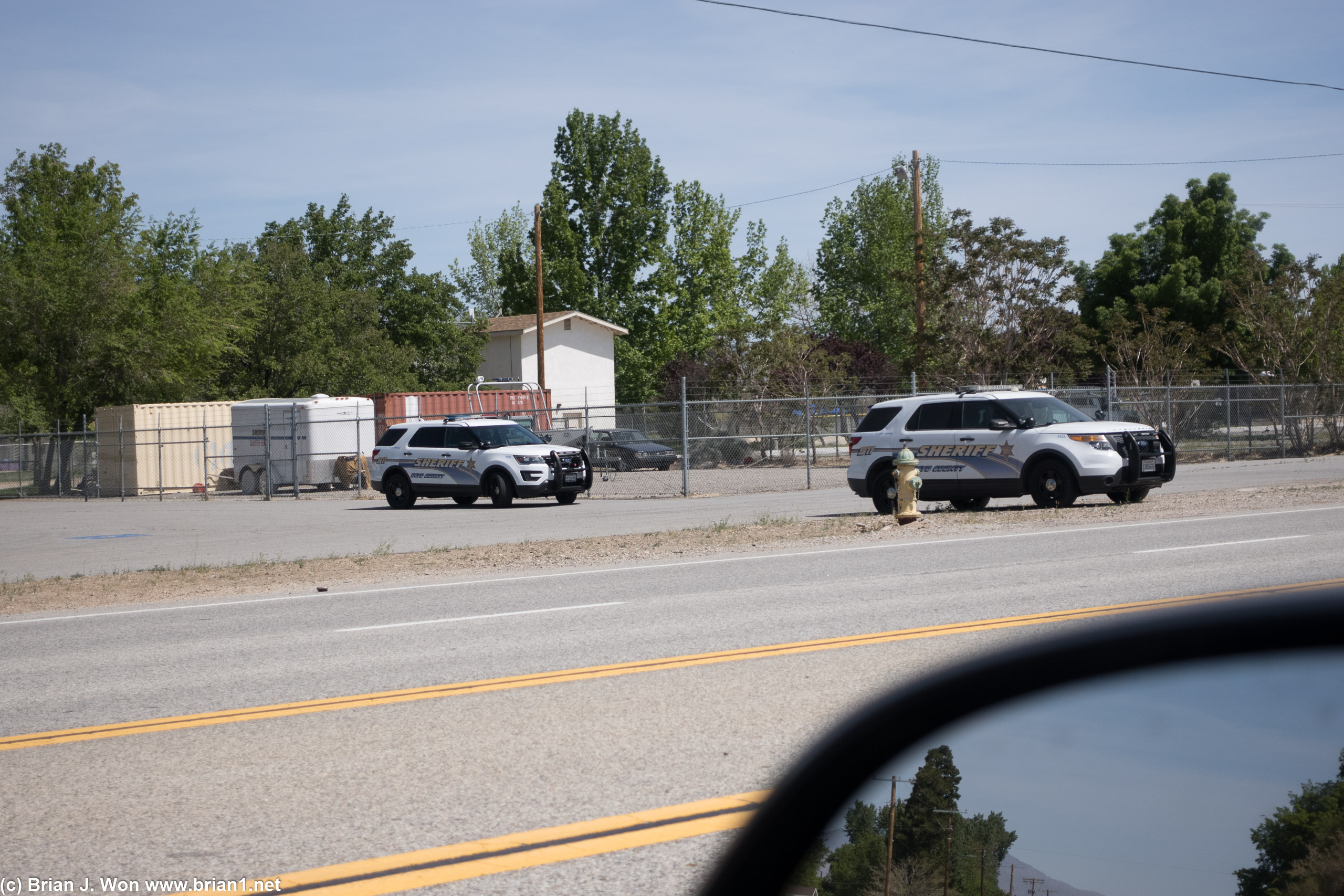 Empty Inyo County Sheriff's cars placed to deter speeders.