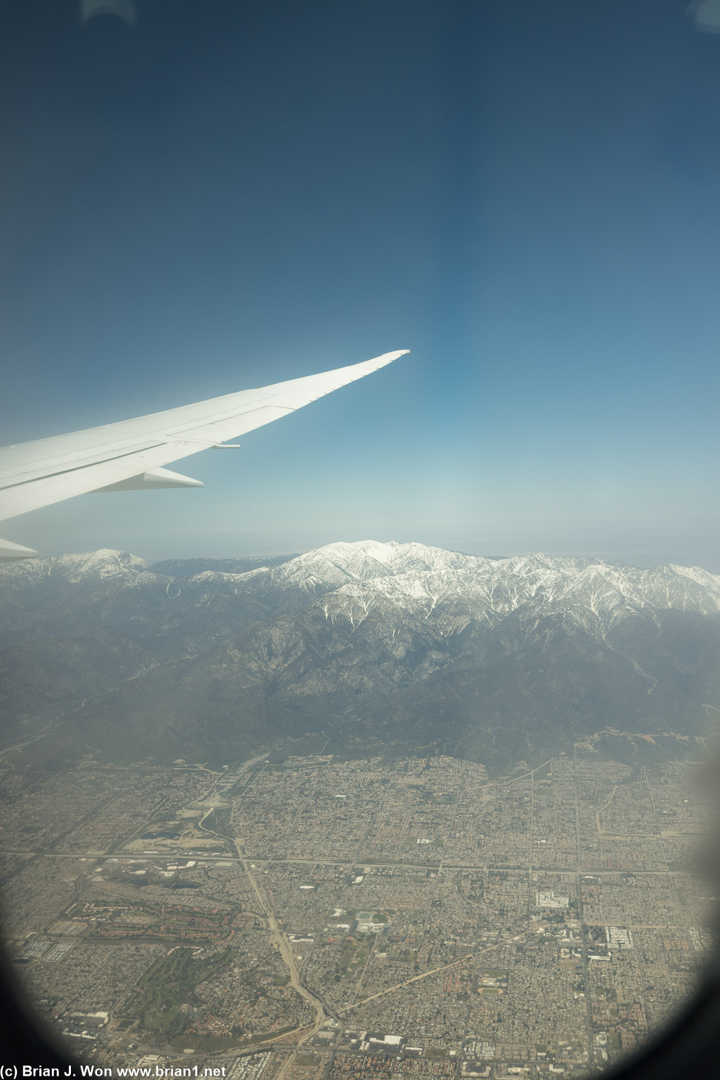 Final approach to LAX, with the San Bernardino Mountains covered in snow.