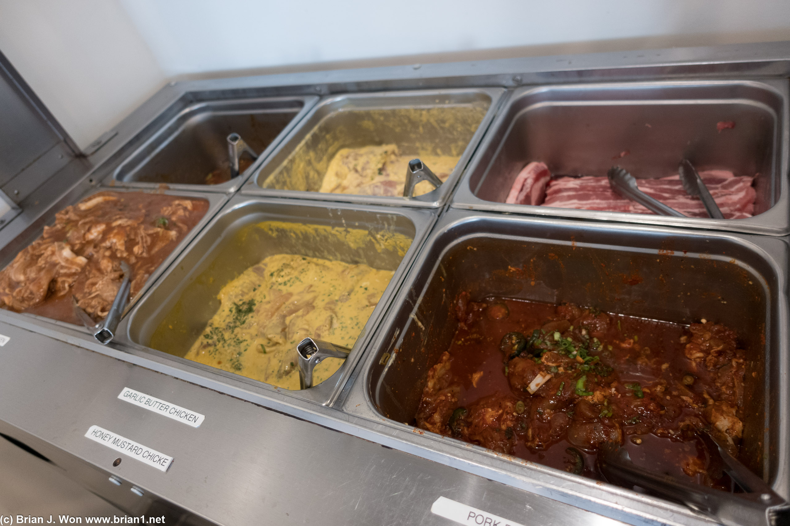 Part of the buffet-- ban chan, pork belly, and chicken.