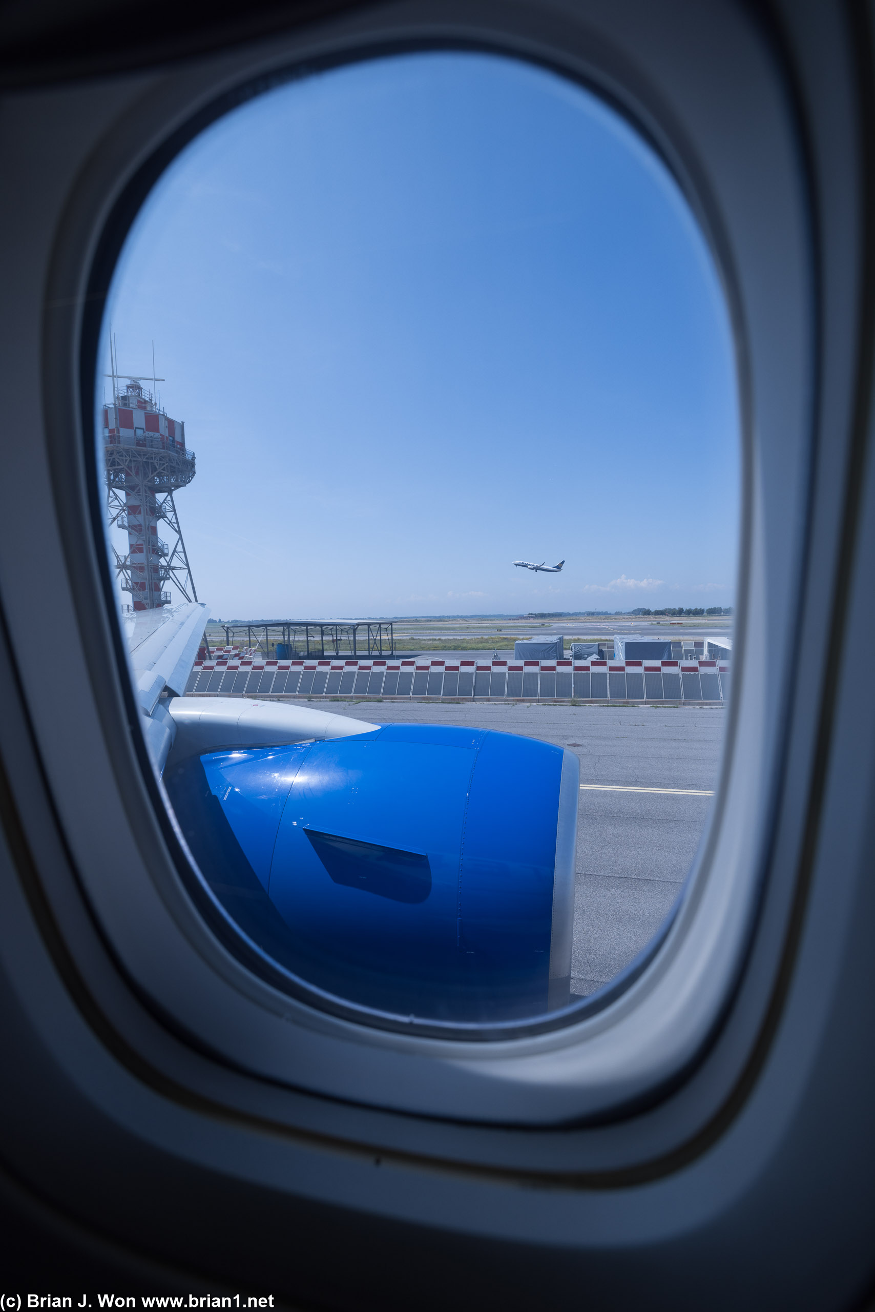 Ryanair 737-800 taking off as we taxi to the runway.