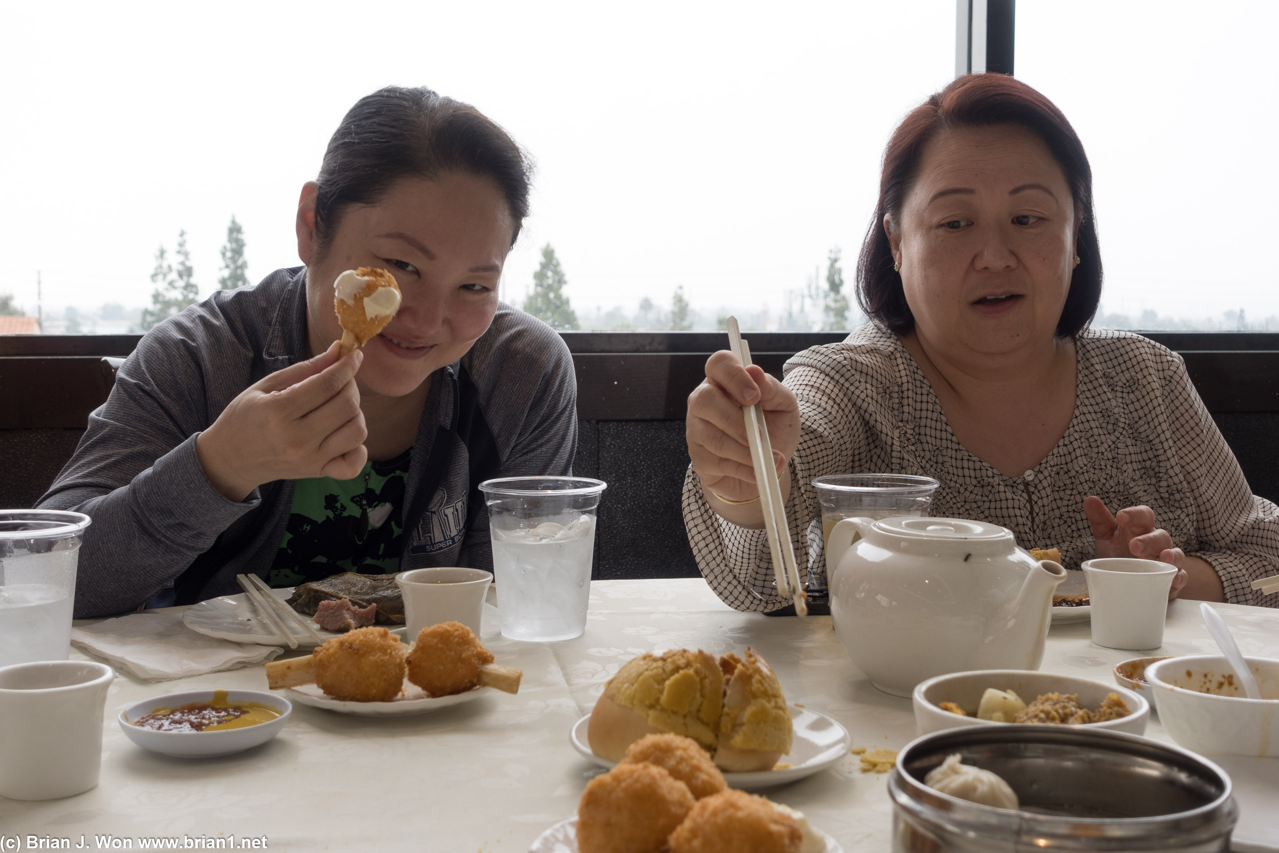 Kristina had to have her deep fried shrimp ball on a sugarcane stick.