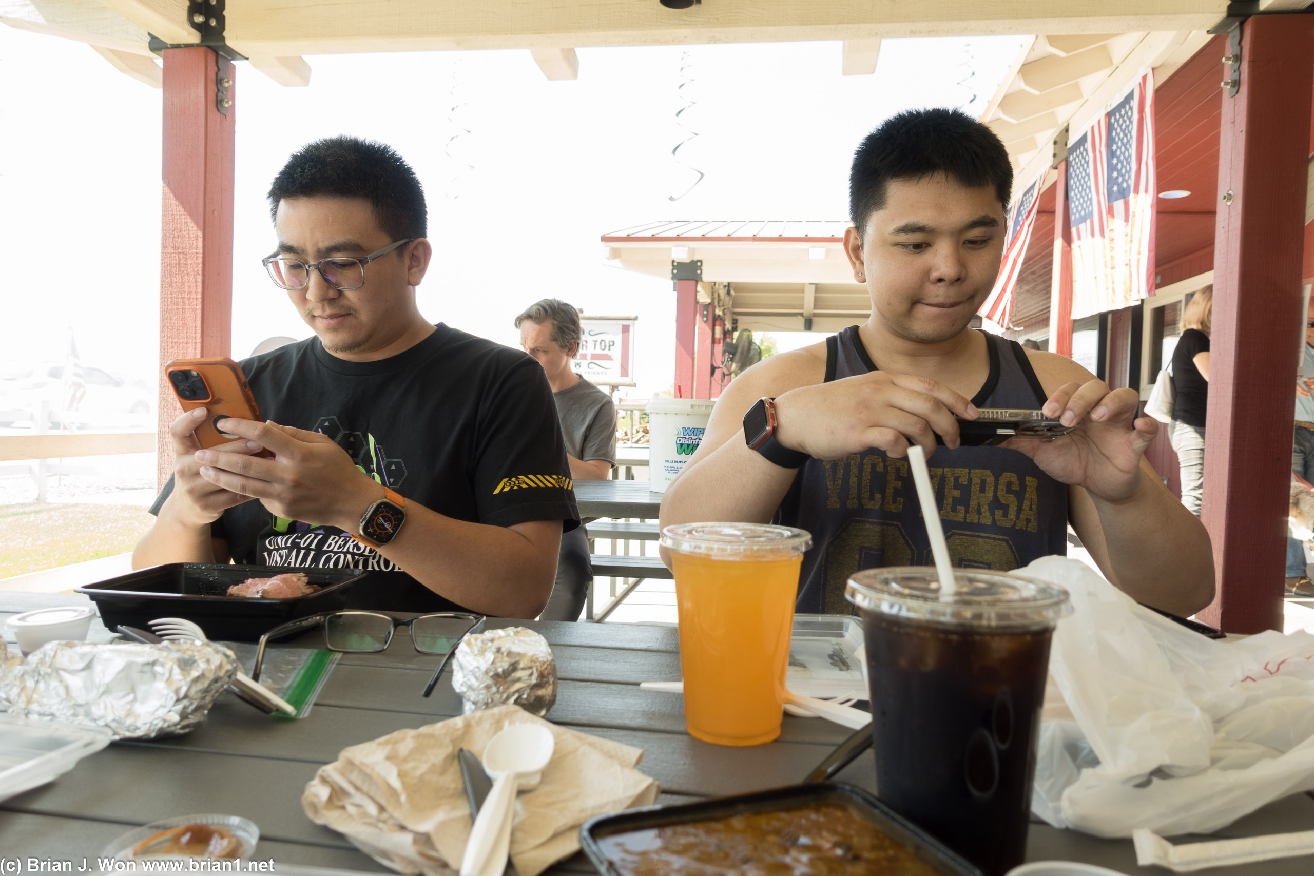 Siva and Madison also photographing their food.