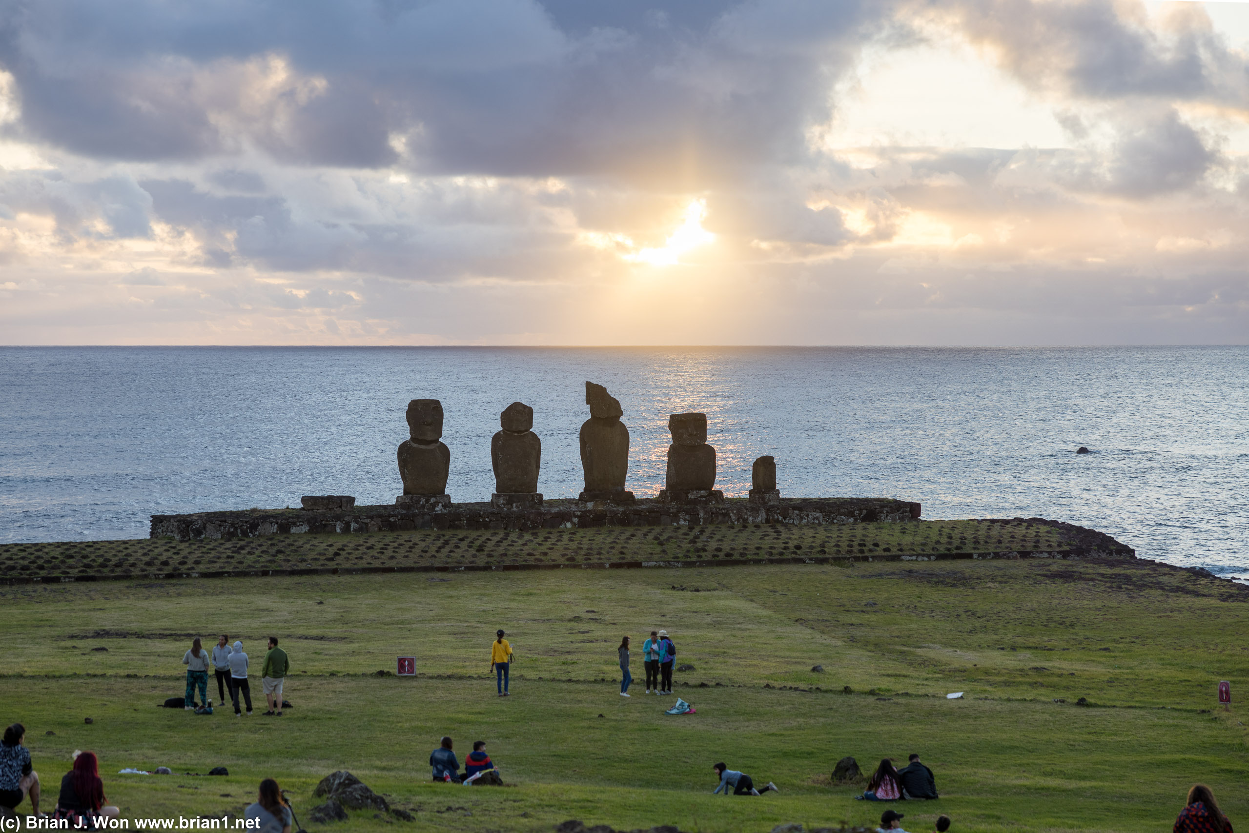 Five moai and a big crowd enjoying an evening picnic or two or ten.