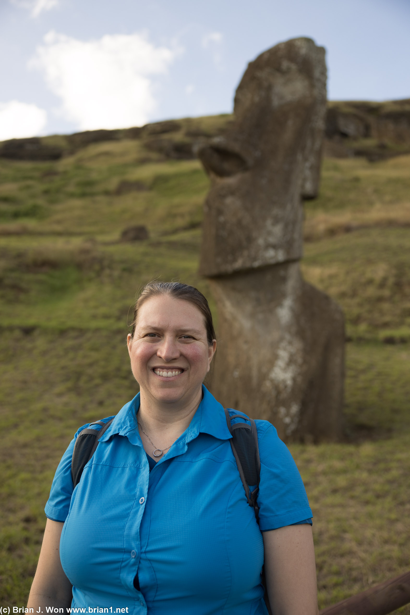 Alicia posing with a moai.