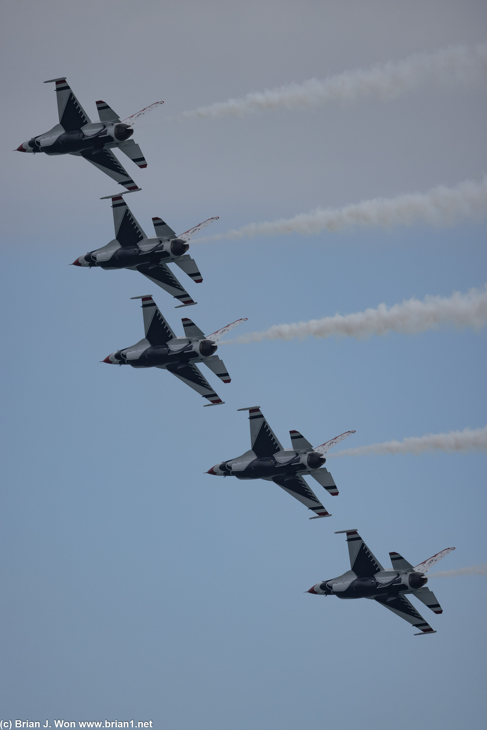 Five USAF Thunderbirds in formation.