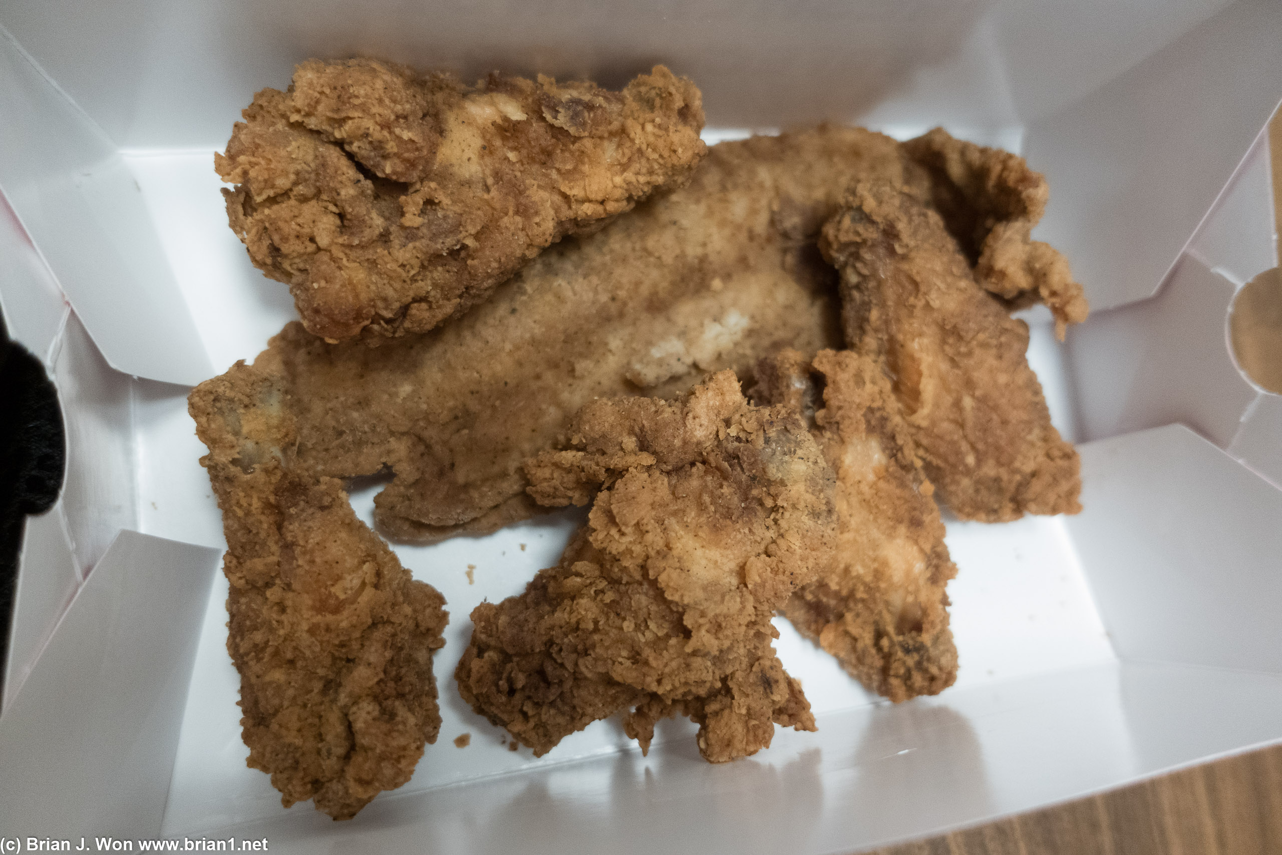 Krispy Krunchy Chicken's fried chicken and fried swai. It's... sort of edible.