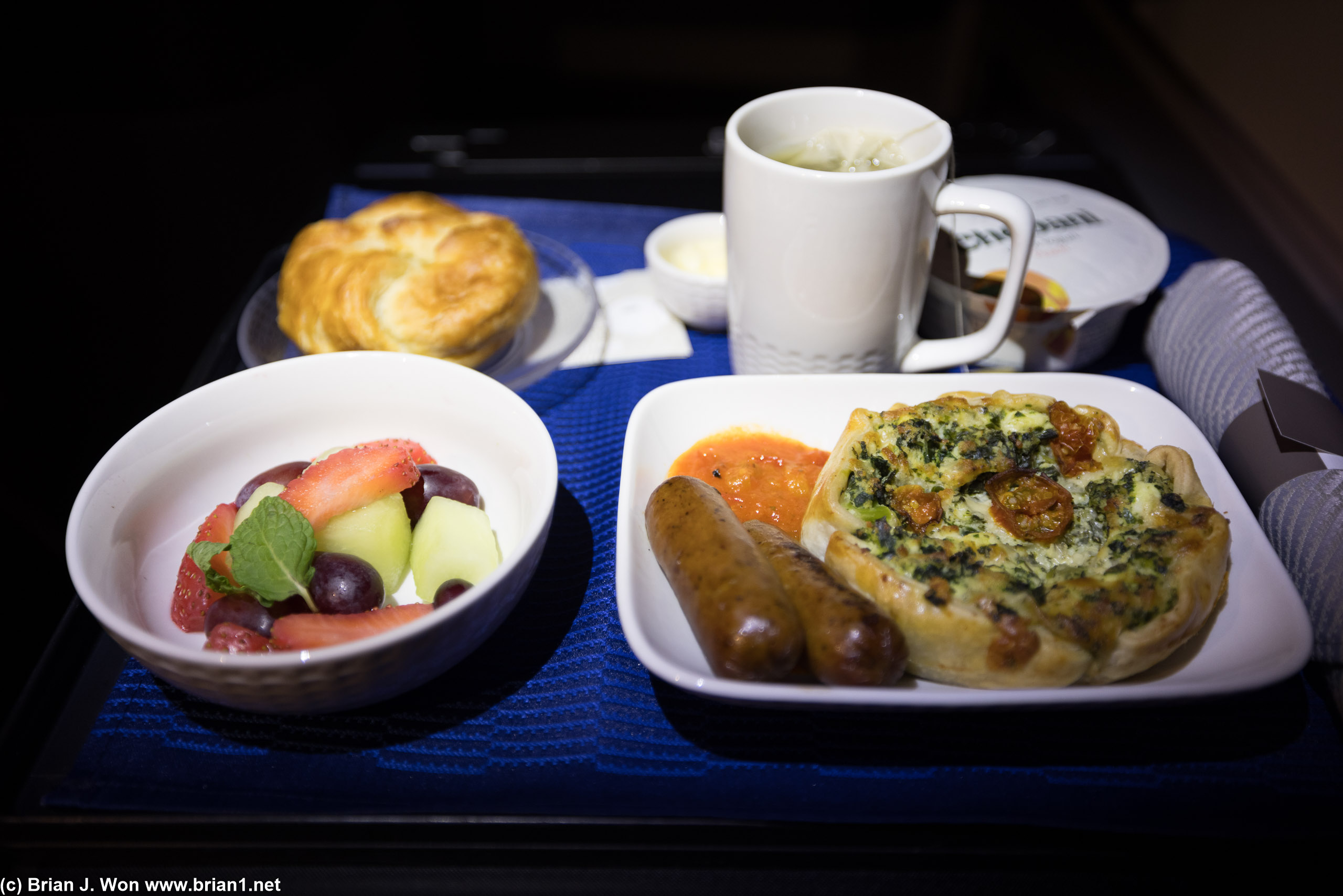 Tomato and kale thing for breakfast plus sausage, actually not bad.