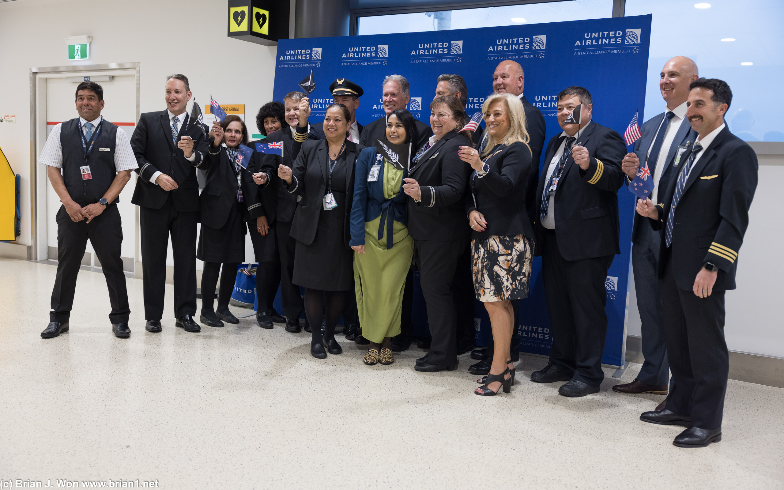 Inaugural flight crew with local staff.