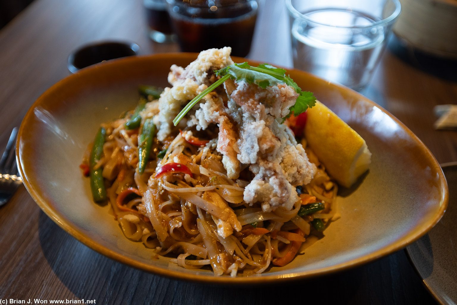 Daily special, chicken pad thai topped with soft shell crab.