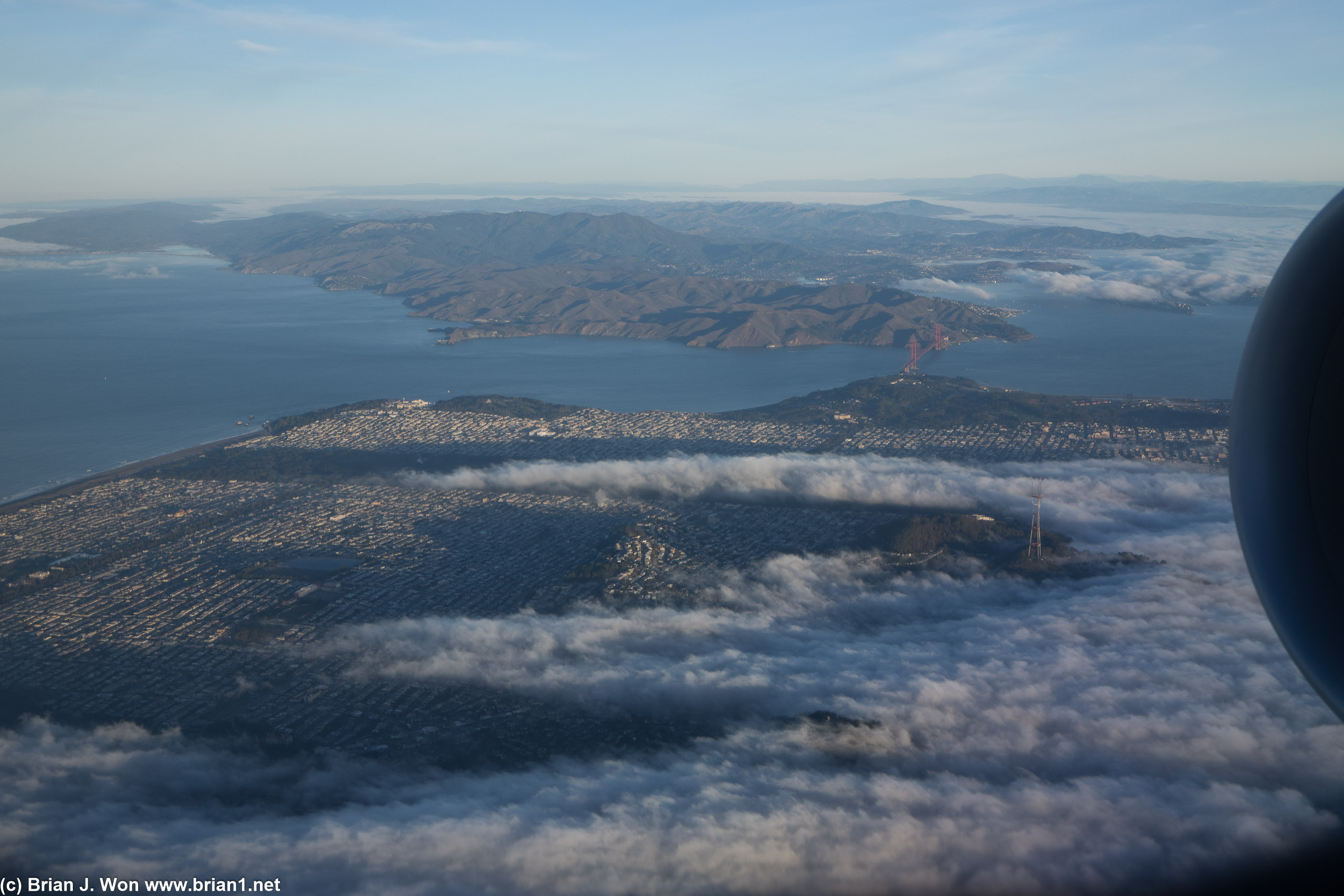 Fog releasing its overnight grip on San Francisco.