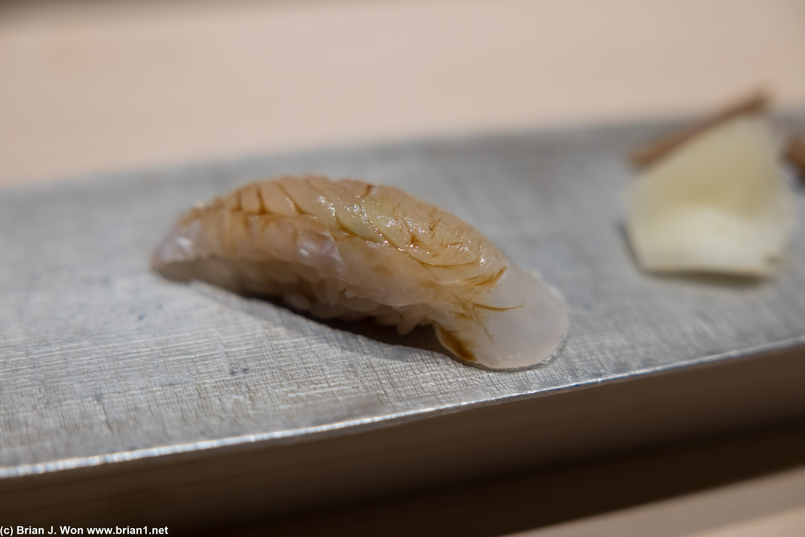 Sushi begins with hirame (flounder).