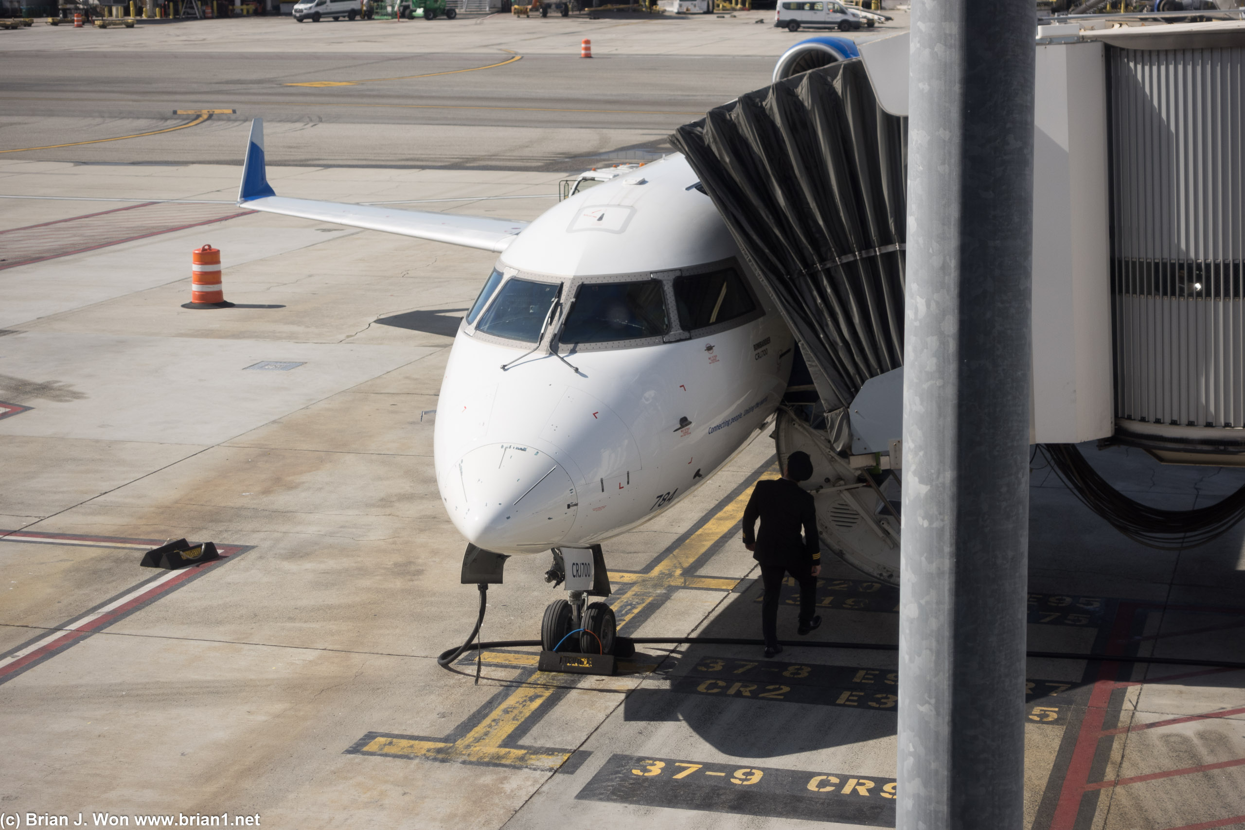 Watching a Skywest CRJ200 first officer do pre-flight inspection.