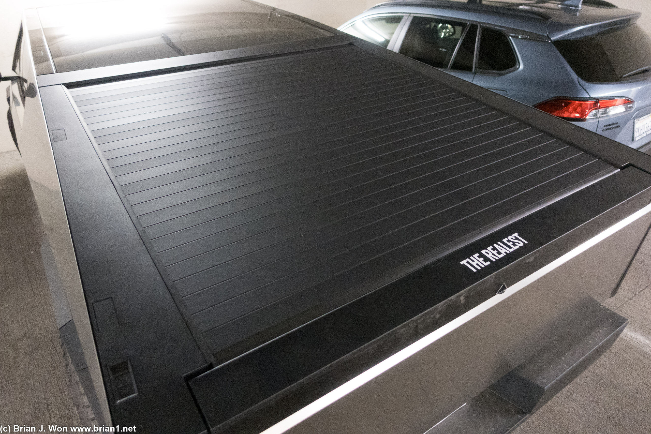 The bed, with its finger-chopping tonneau cover.