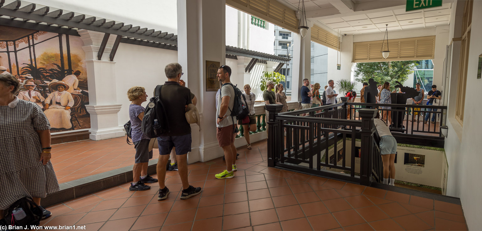 Only part of the line to the famous Long Bar at Raffles Hotel.