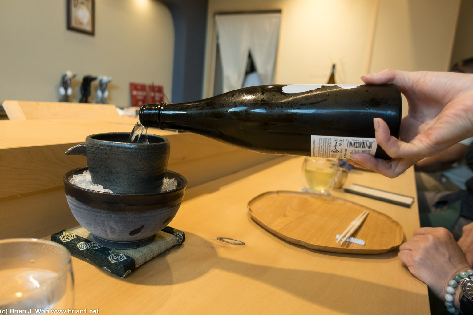 Pouring sake.
