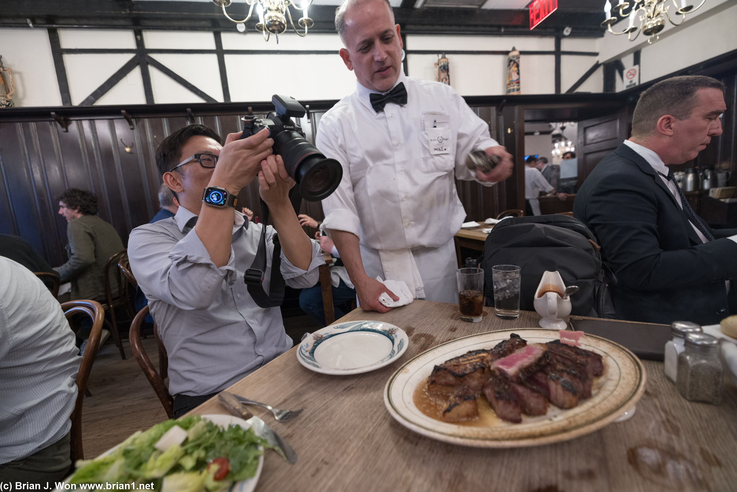 Mike explaining how it's dry aged and so fatty it doesn't need butter.