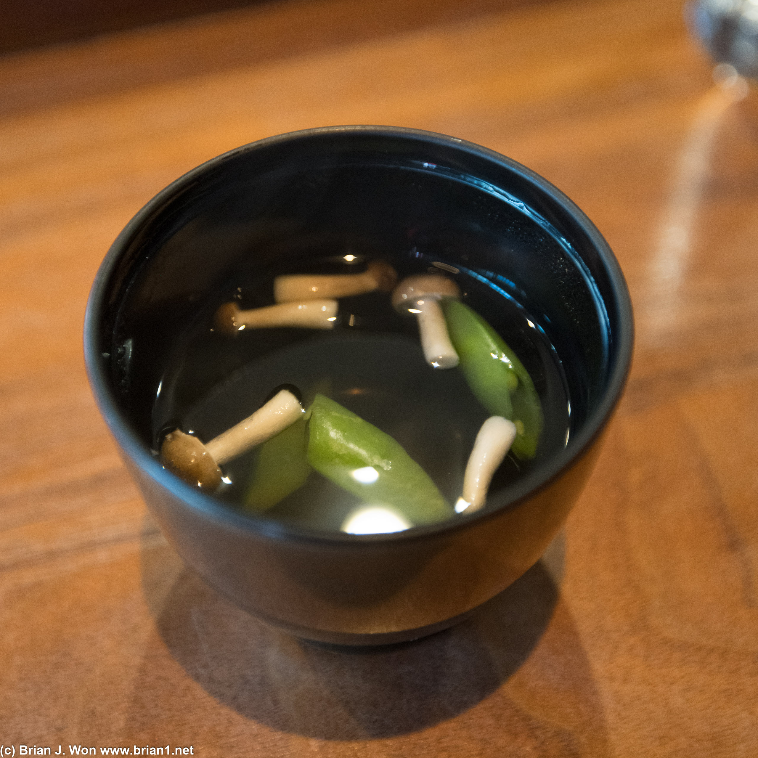 Clear daishi soup with Shima aji mushrooms and snap peas.