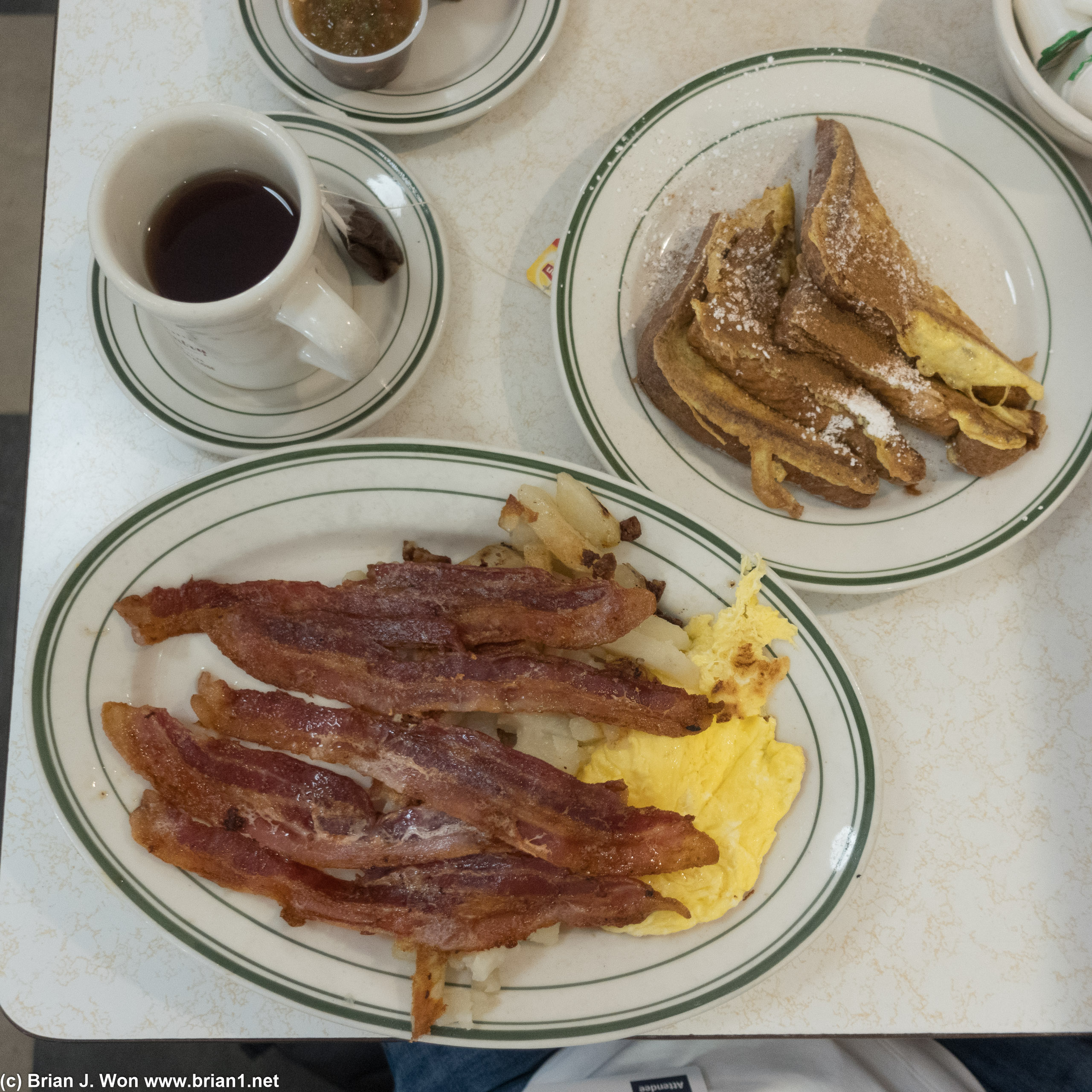 French toast, eggs, hash browns, bacon.