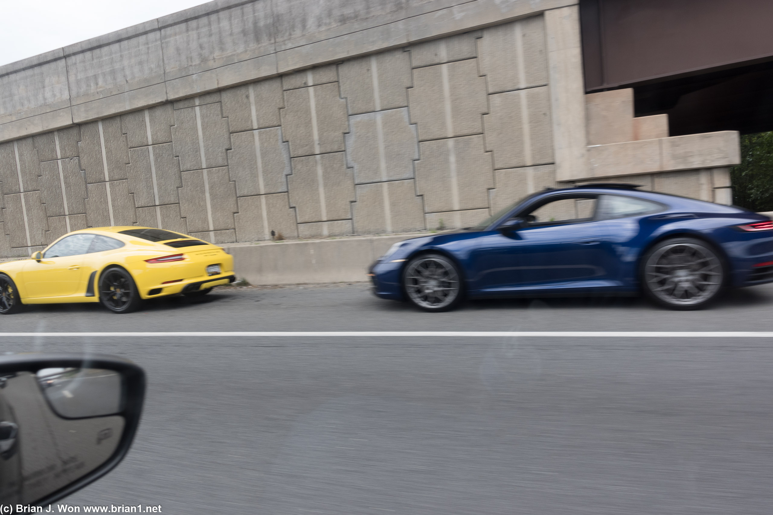 Bunch of Porsche 911's pulled over.