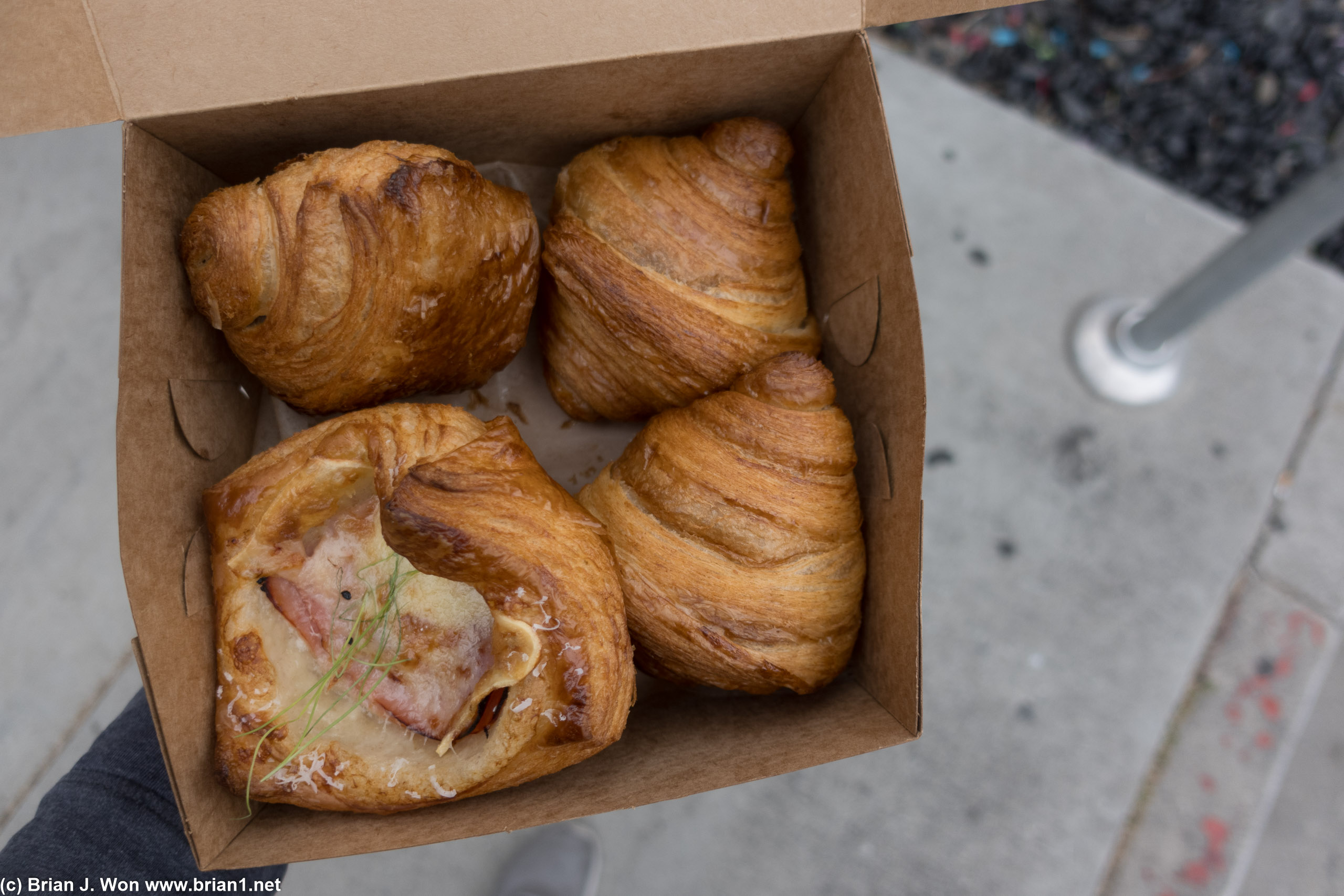 Clockwise from ham and cheese, pain au chocolat, regular croissant.