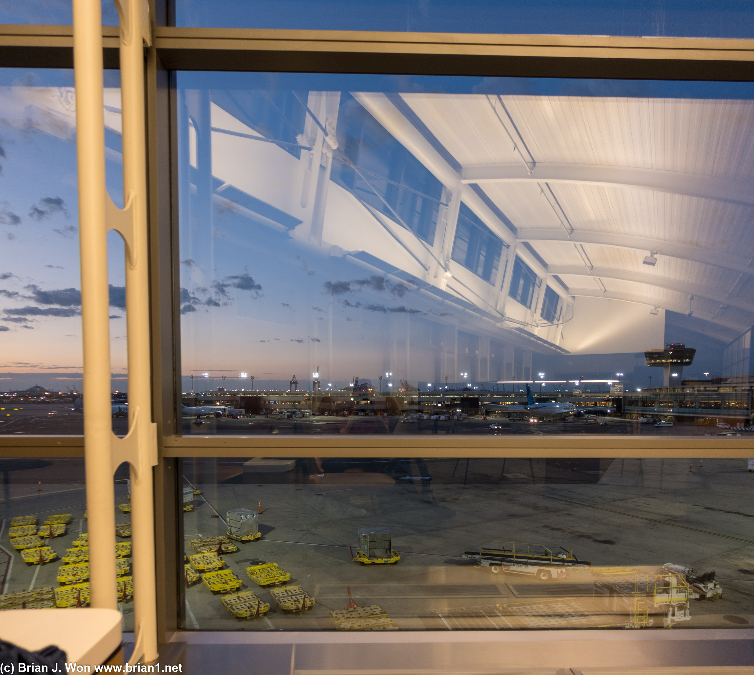 5:05am sunrise views from the United Club by gate C123 at Newark Airport.