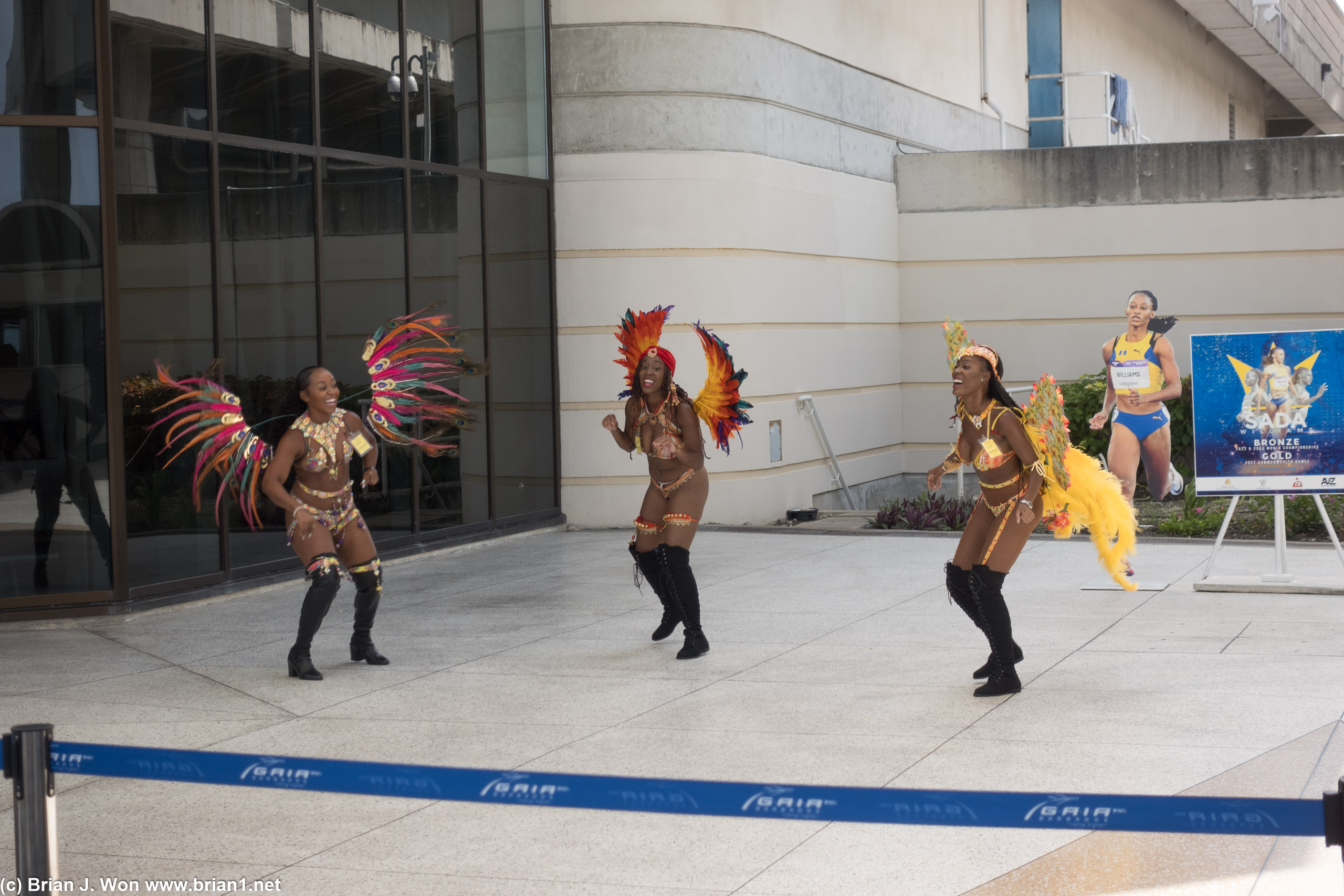 Dancers greeting passengers.