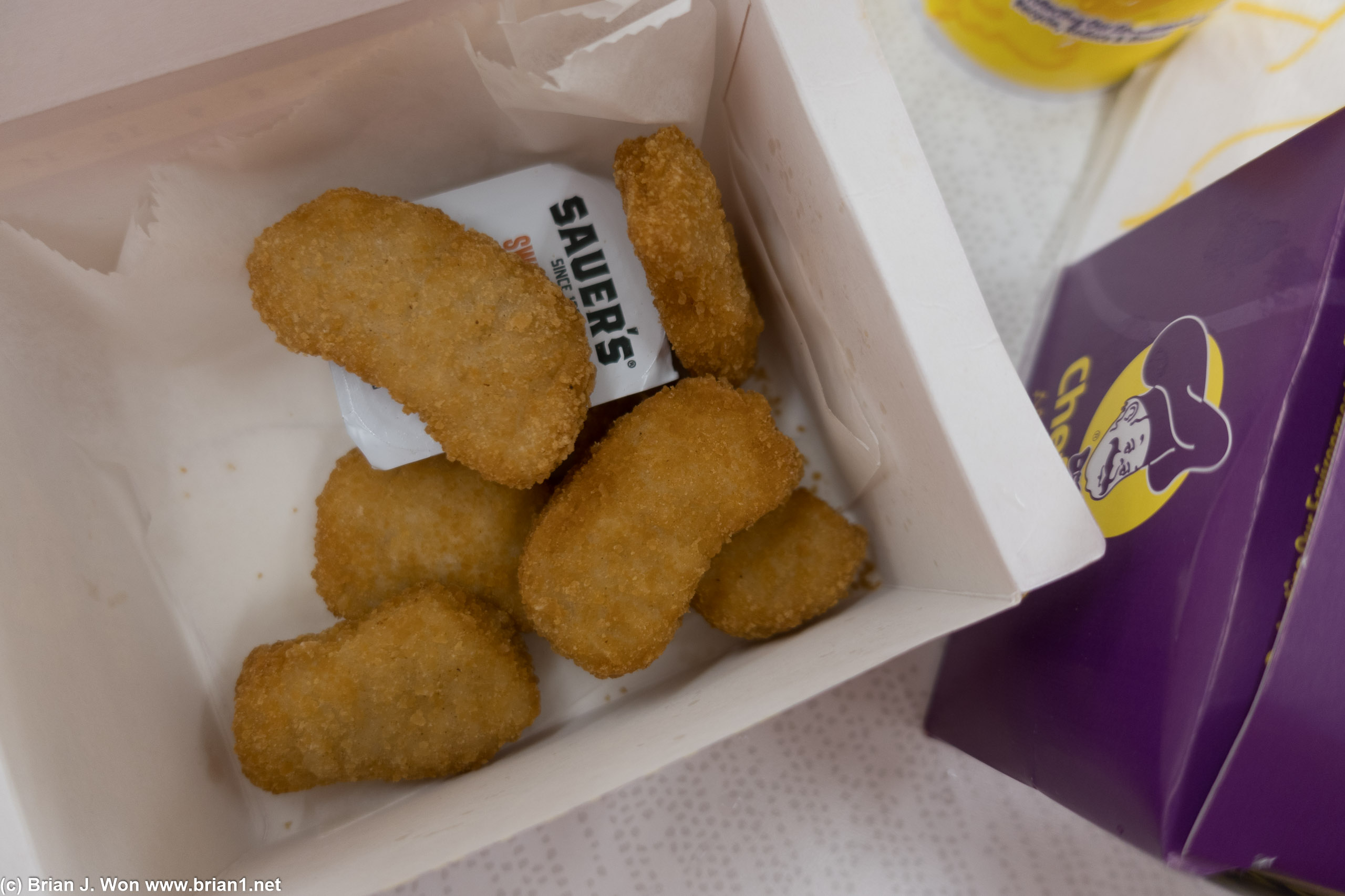 The chicken nuggets are not quite as sad as they look, but they're not great either.