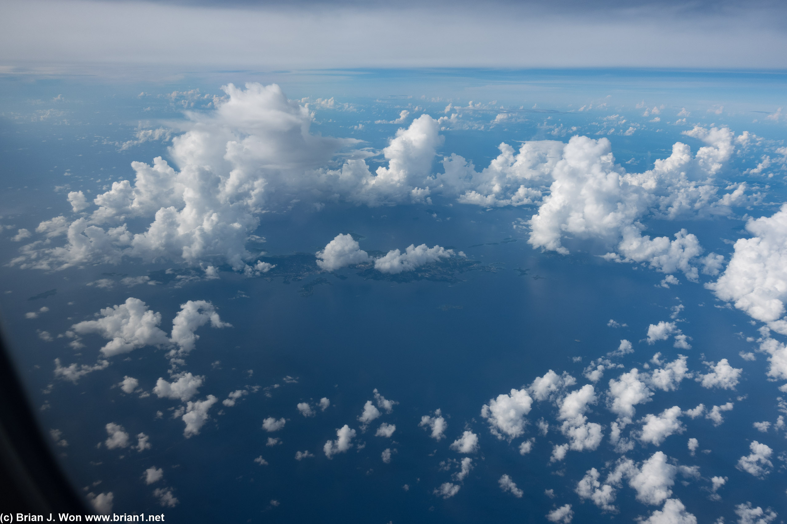 Over the US Virgin Islands-- the British Virgin Islands are hidden by clouds to the right/top..