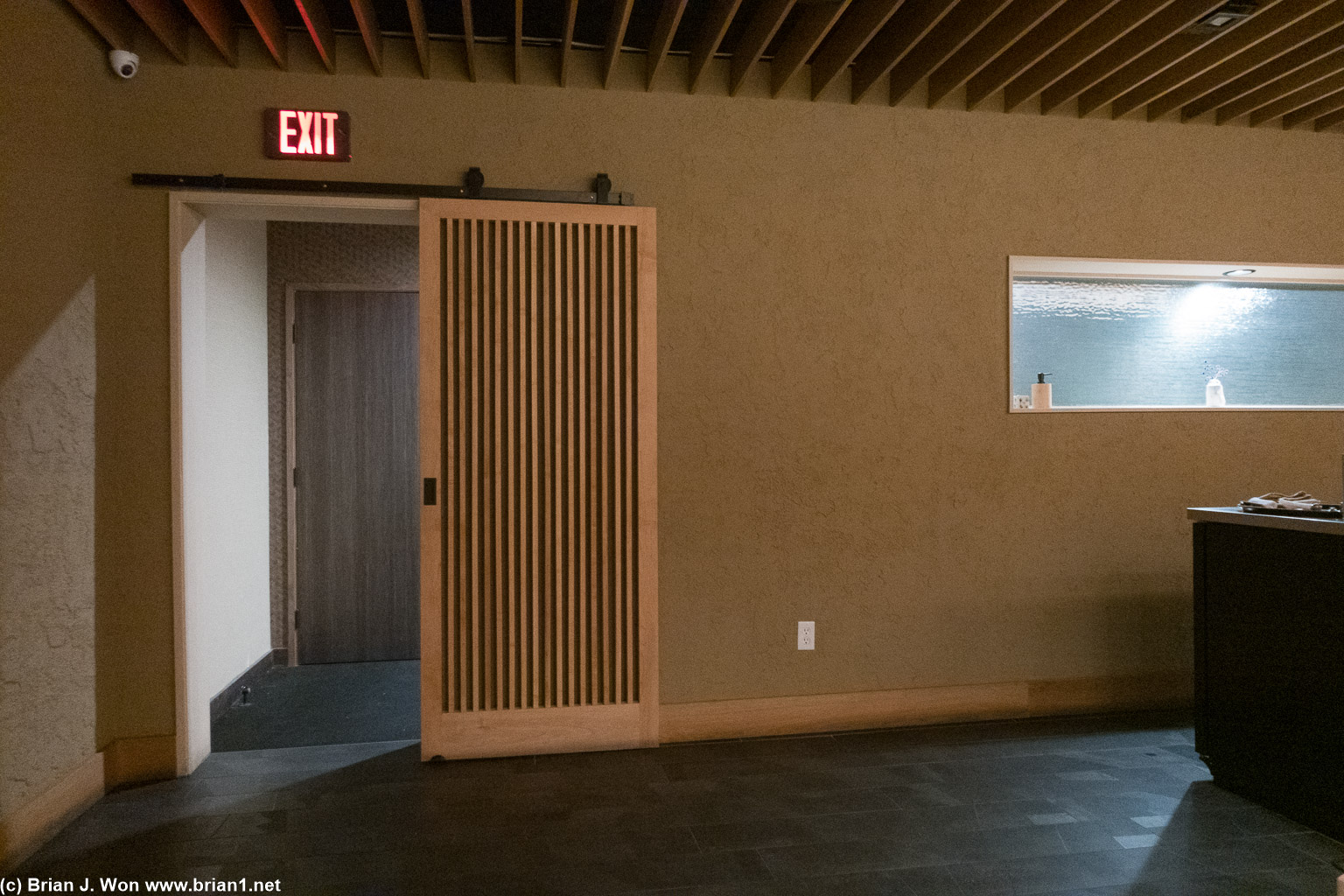 Looking from the bar to the customer entrance.