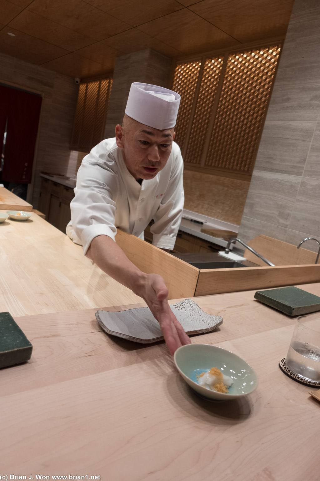 Chef Inoue-san serving the next dish.