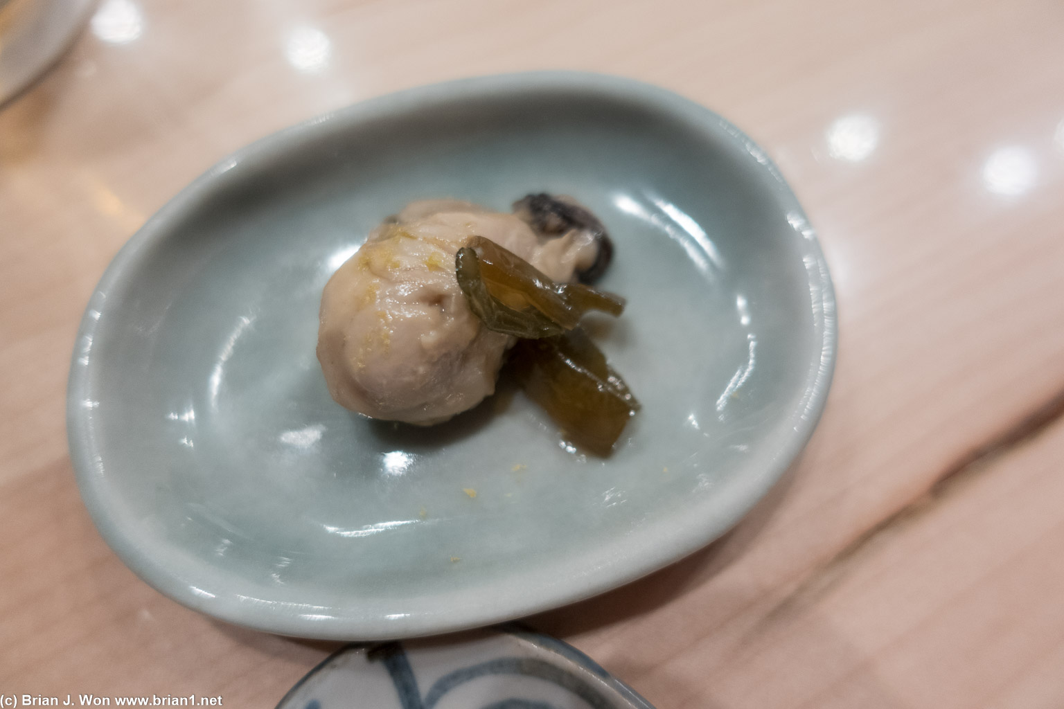 Oyster with seaweed.