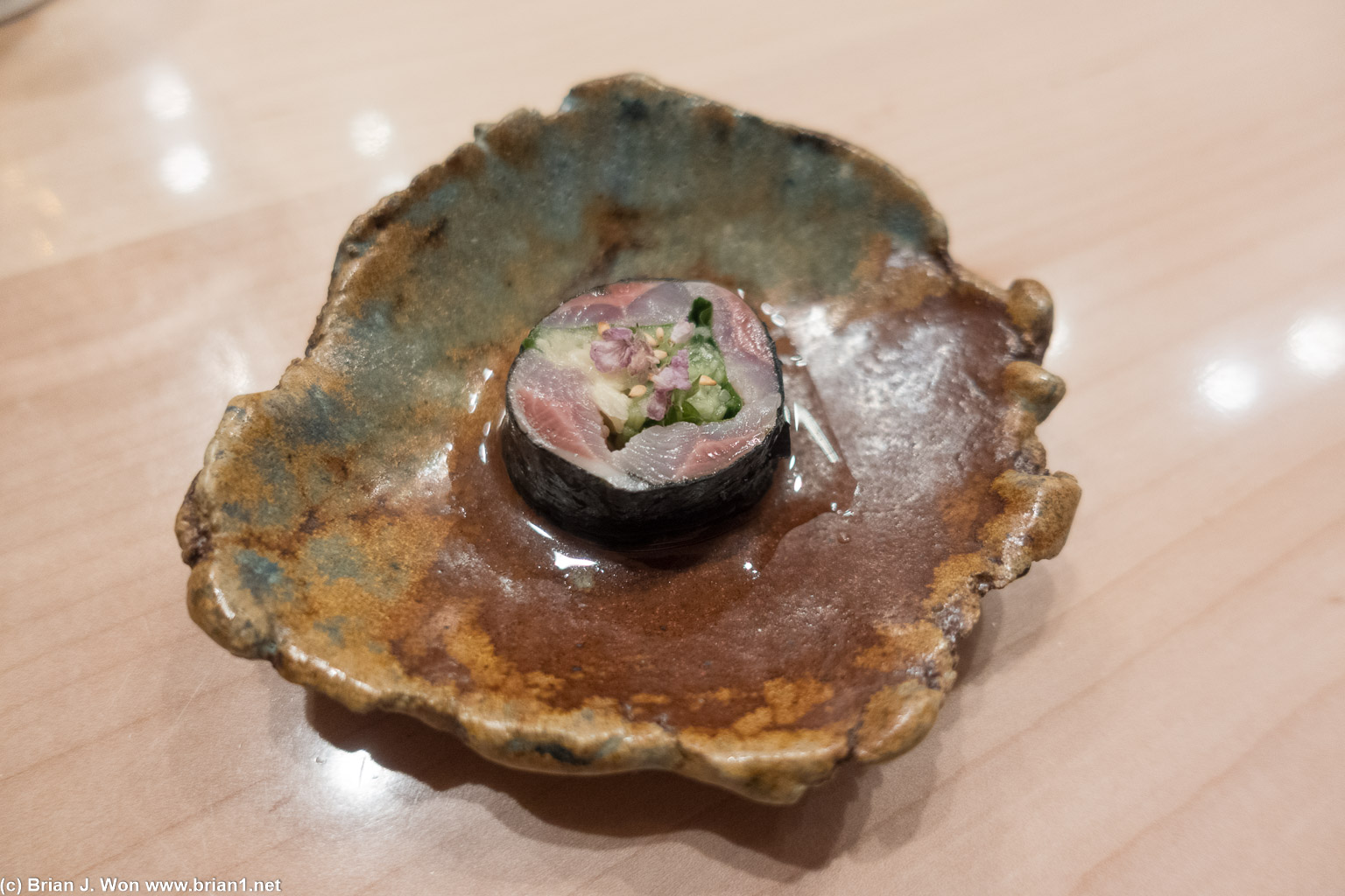 Iwashi maki (sardine, cucumber, ginger, shisho leaf).