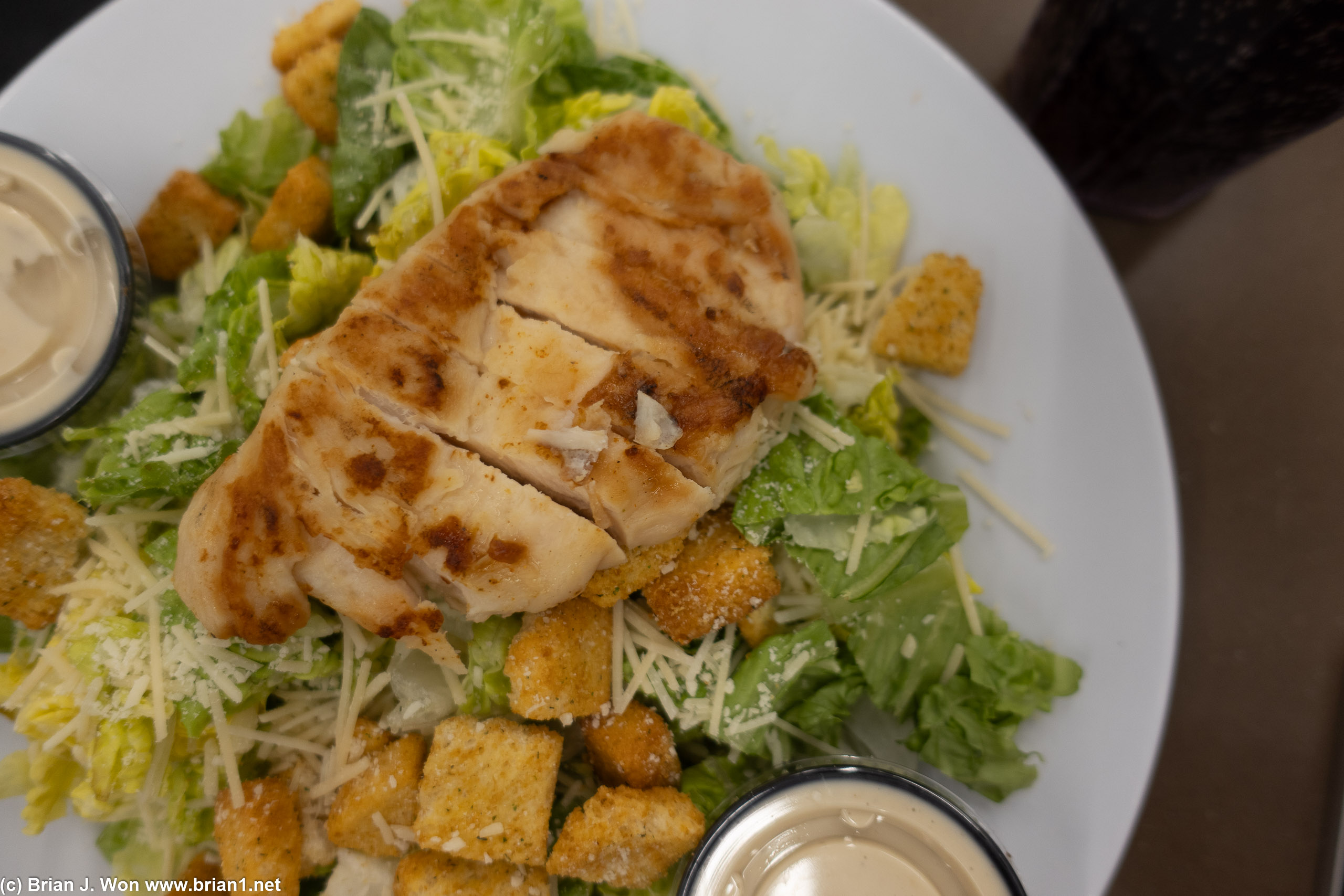 Chicken caesar salad at the airport was not bad.