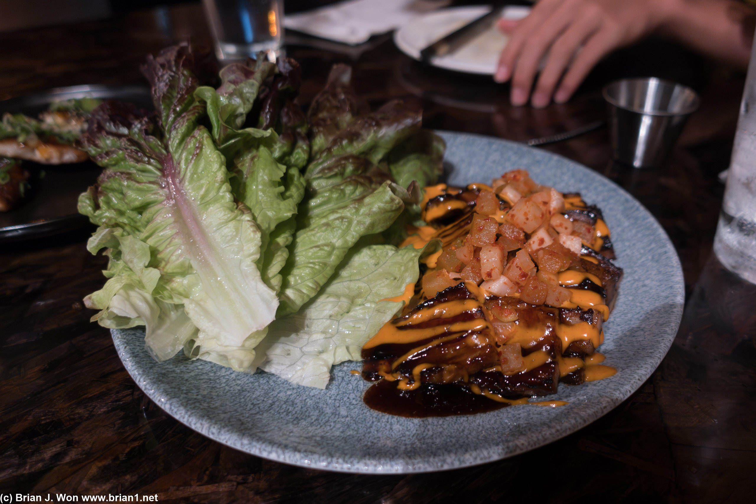 Lettuce wraps with pork, a bit too much sauce.