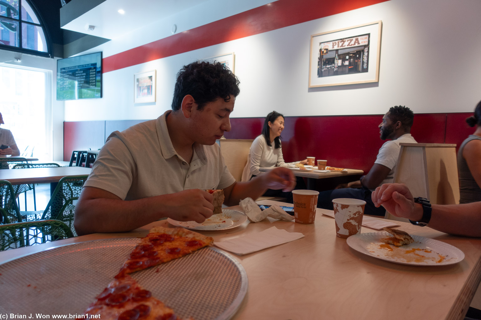 Edward contemplating his pizza.