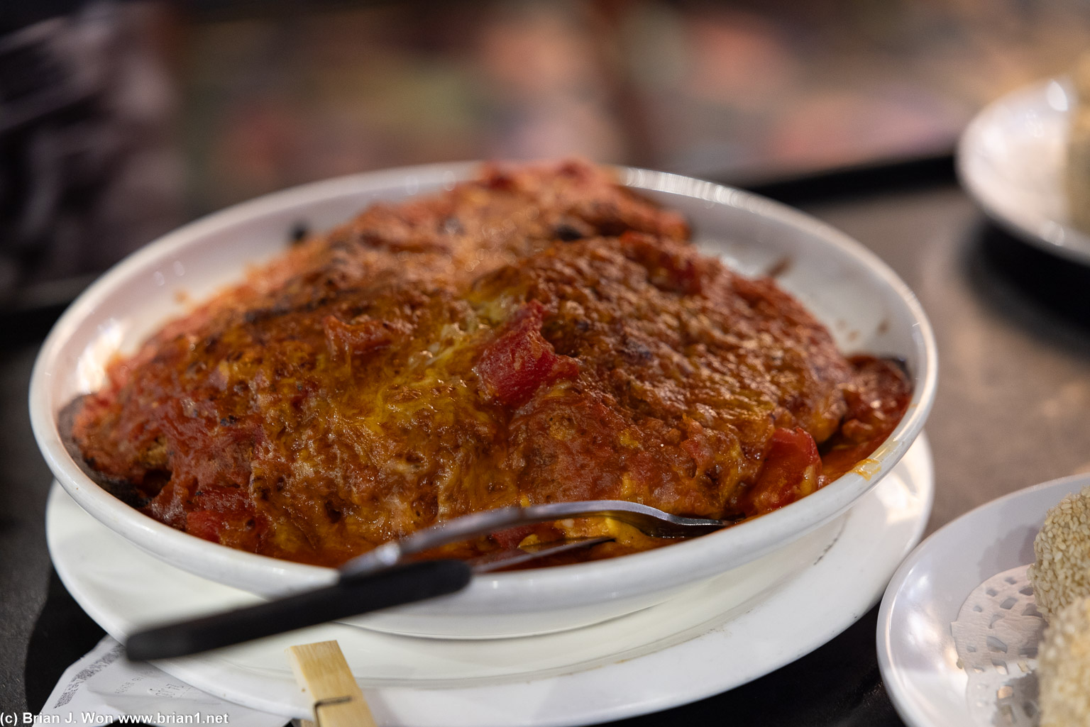 Baked pork chop over rice, maaaaybe this was the favorite dish Pearl was trying to get us to order?