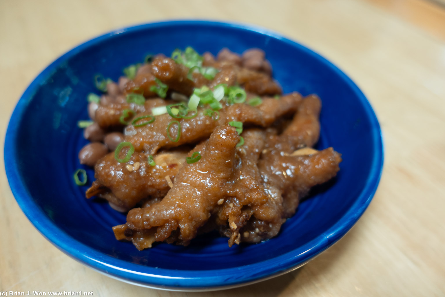 Chicken feet were sliced in half. Odd.