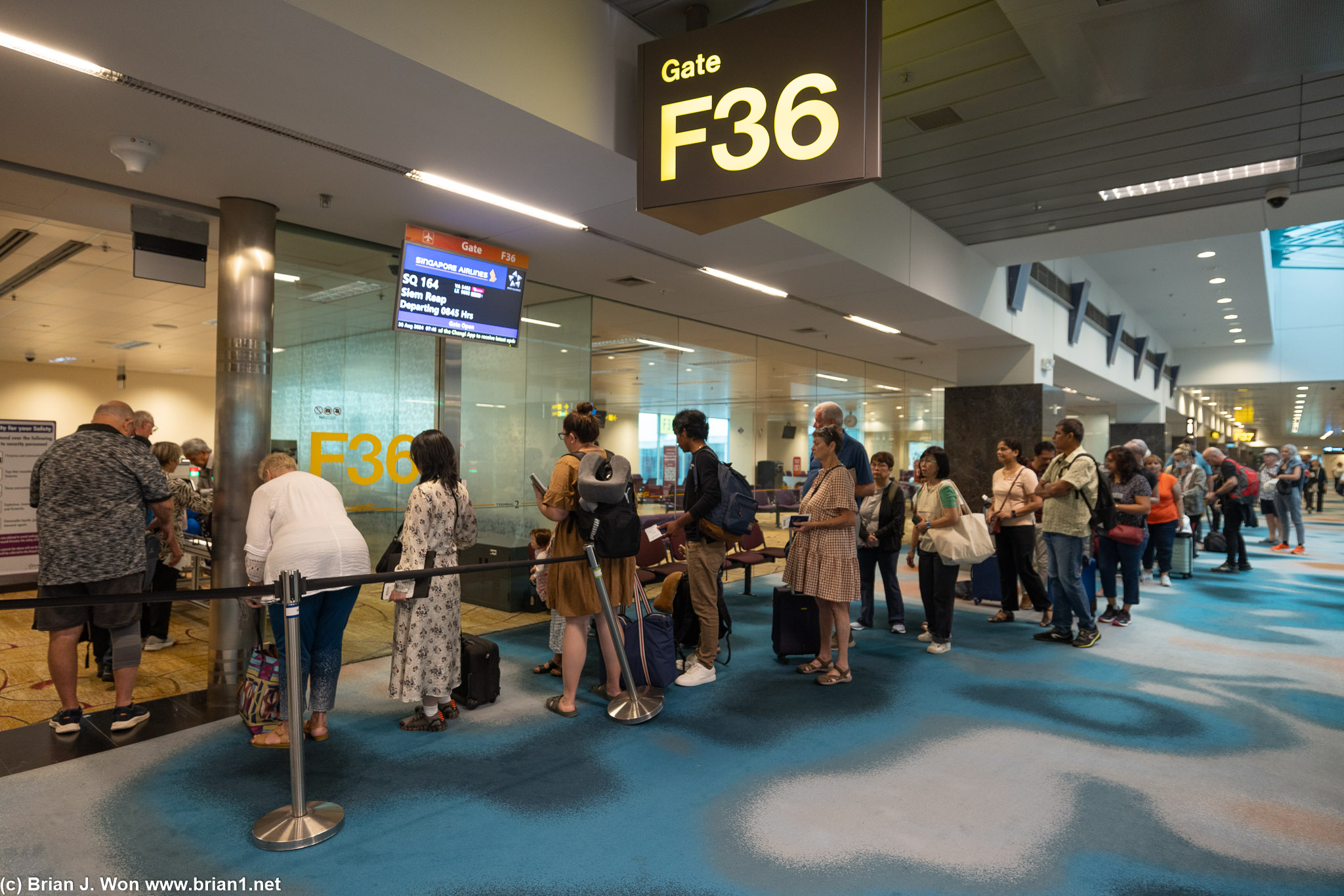 Waiting to enter the gate area/waiting to board SQ 164 to Siem Reap at gate F36.