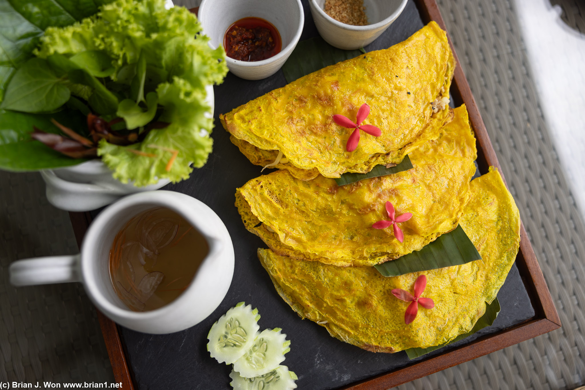 Nom banh chiao (khmer yellow rice crepe with prawn and pork).