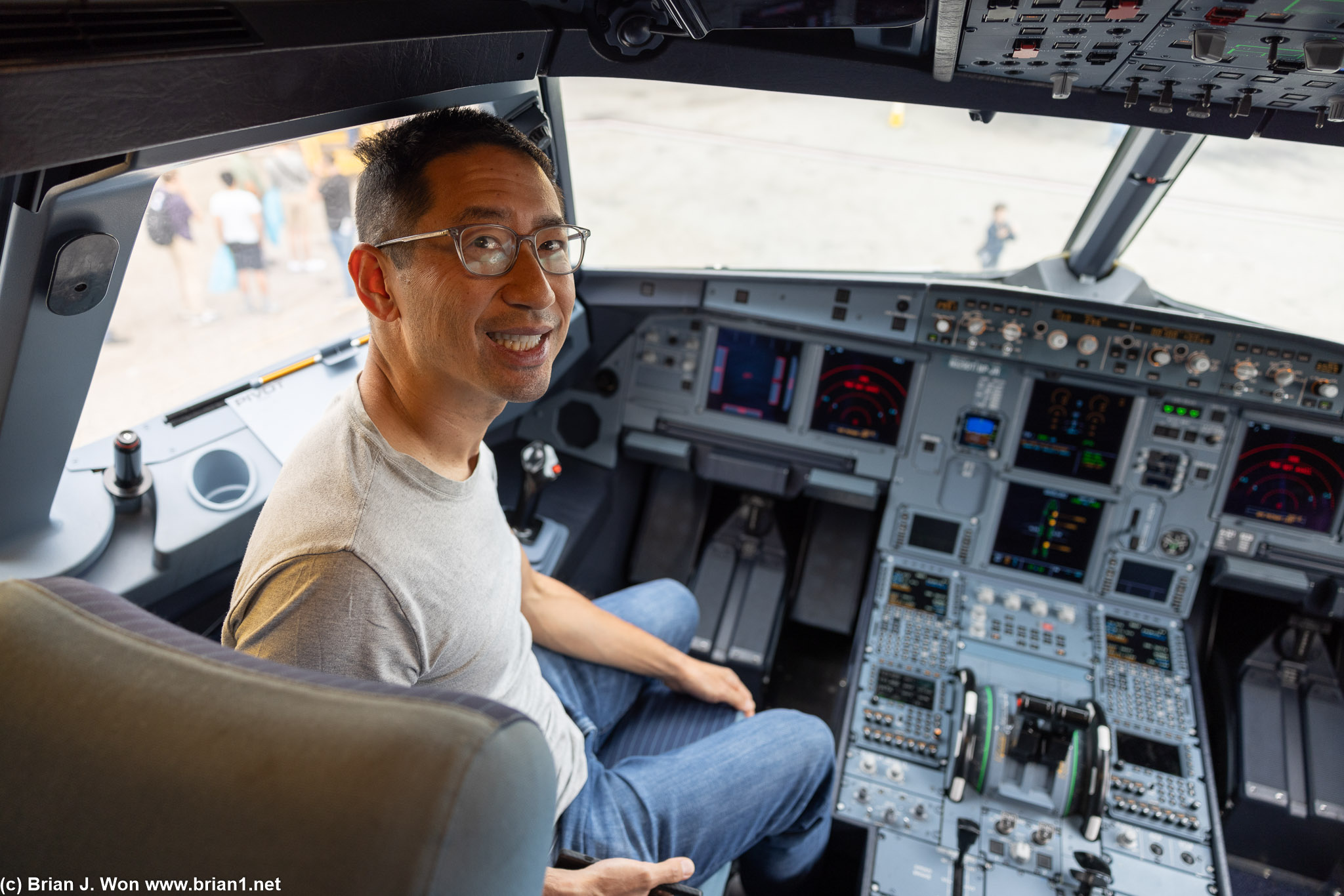 Sitting in the cockpit.