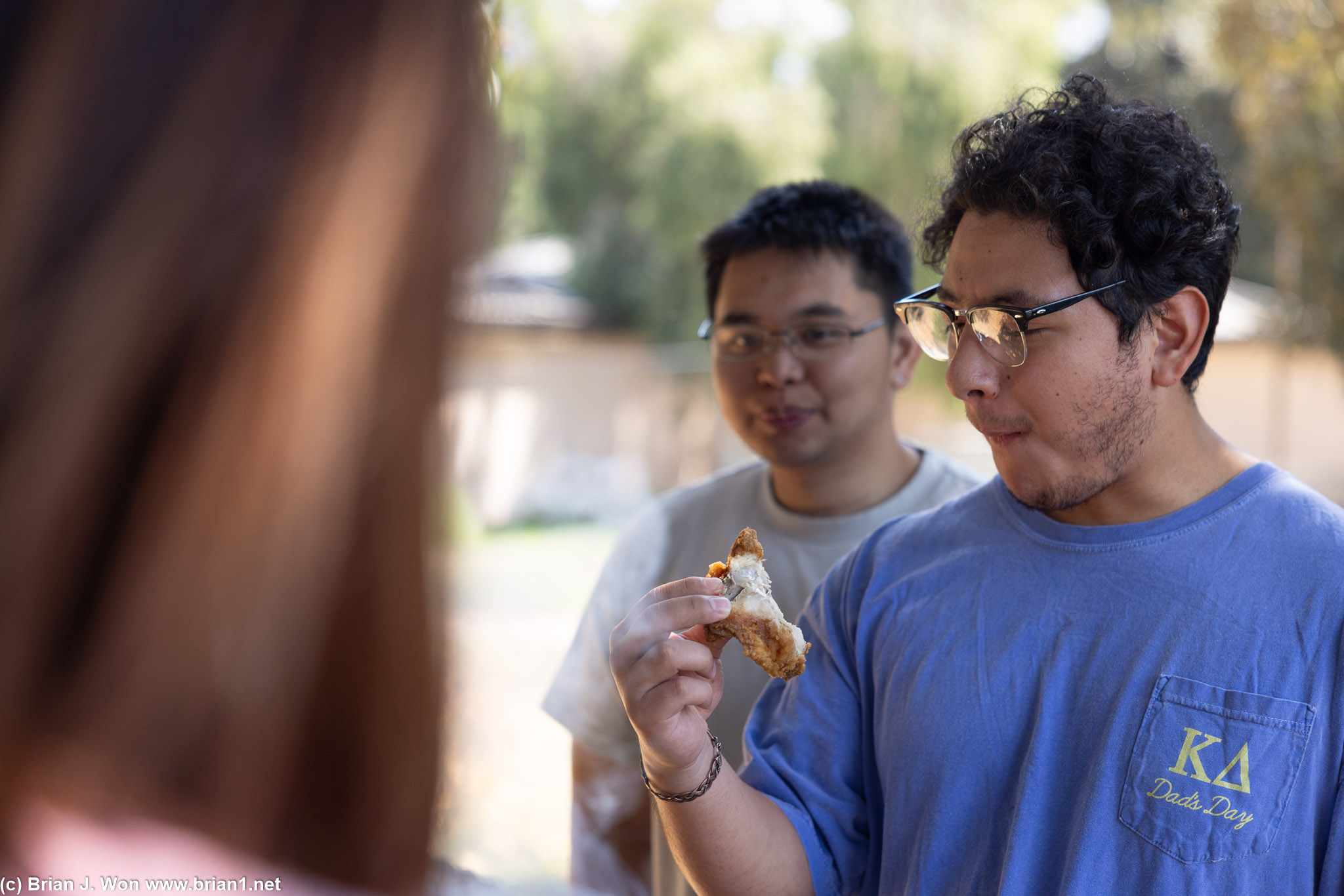 Edward enjoying his fried chicken.