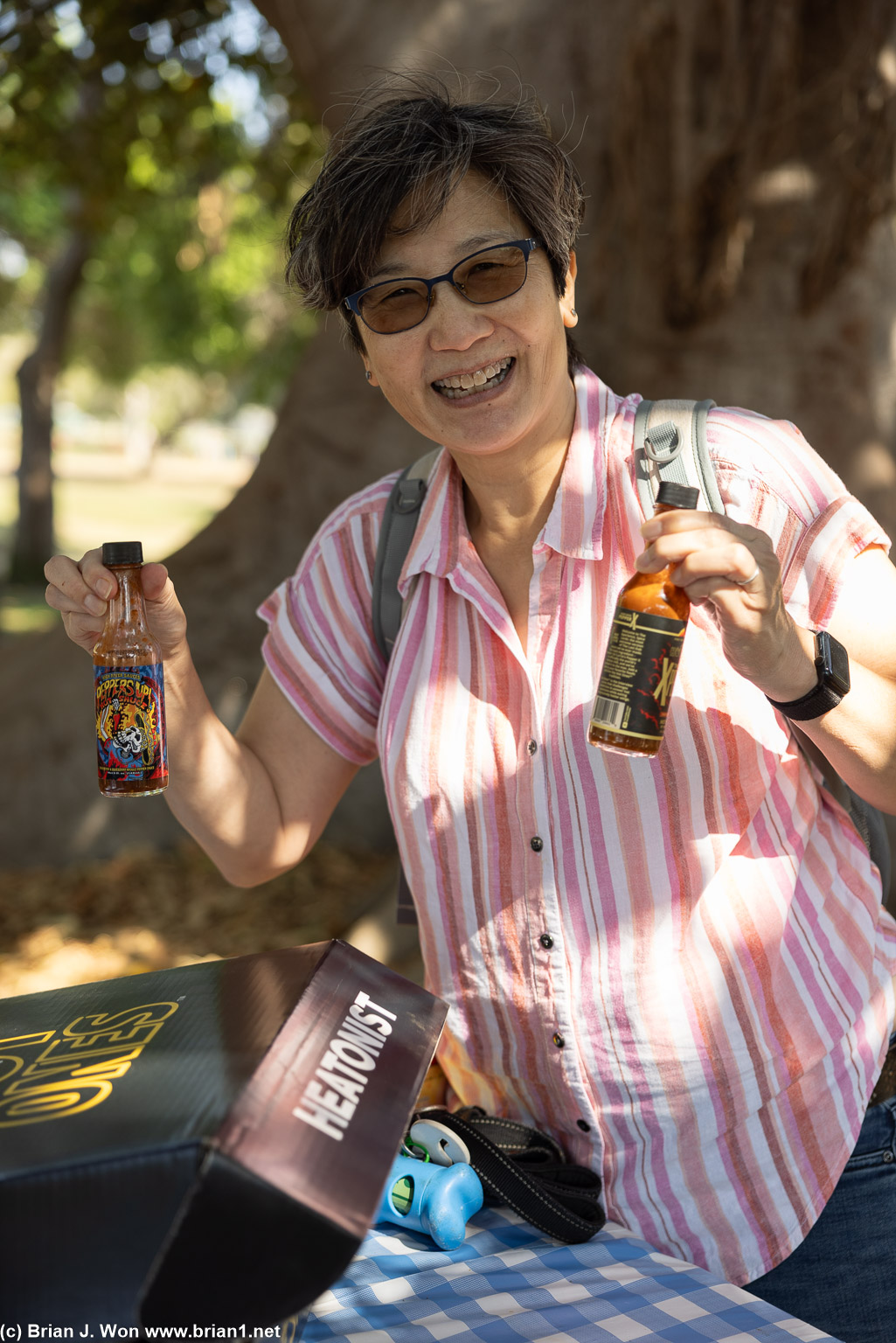 Michelle L. showing off her hot sauce collection.